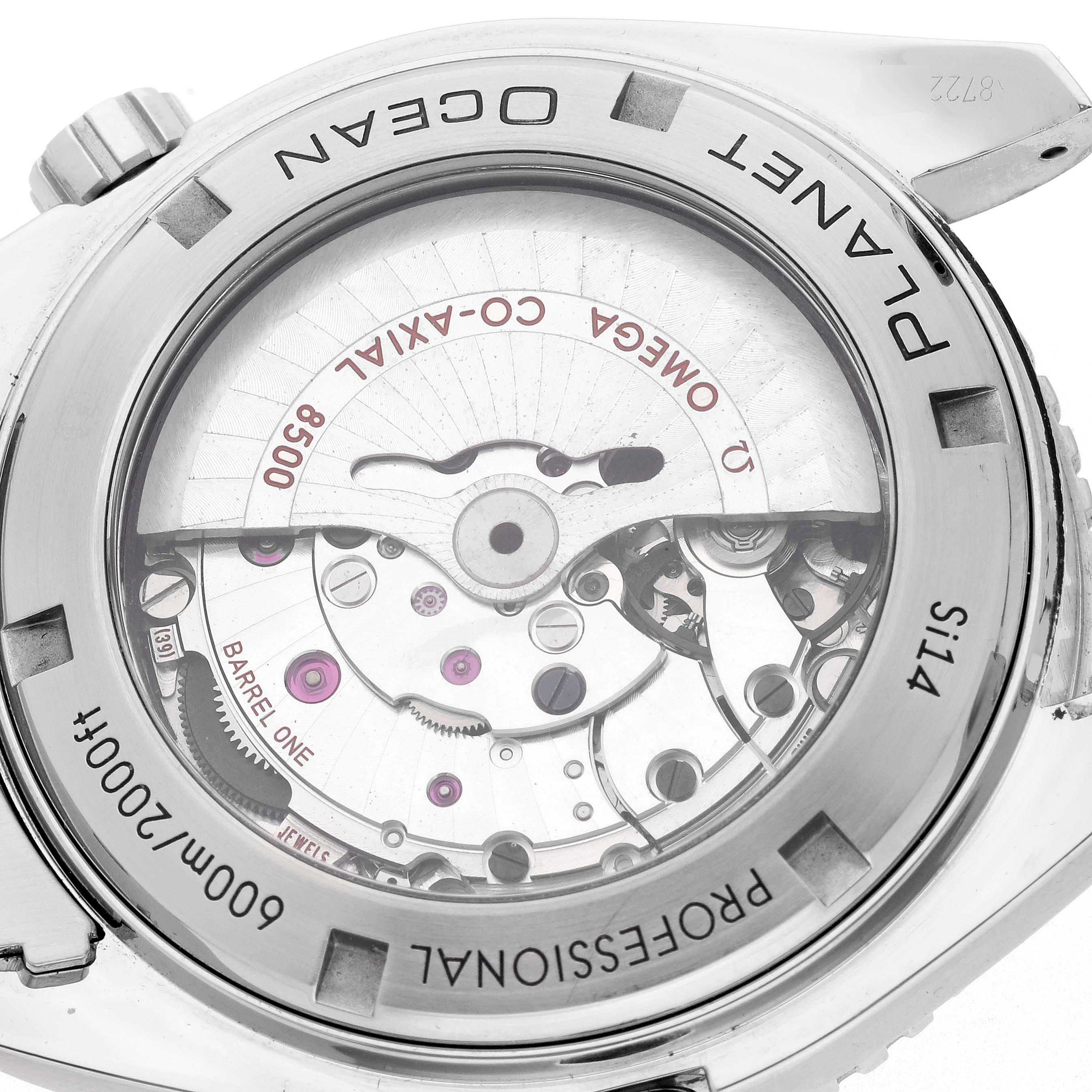 The Omega Planet Ocean 232.30.46.21.01.001 Men's Stainless Steel Black Dial 232.30.46.21.01.001 Men's Stainless Steel Black Dial watch is shown from a back angle, revealing the movement and internal mechanism through a transparent case back.