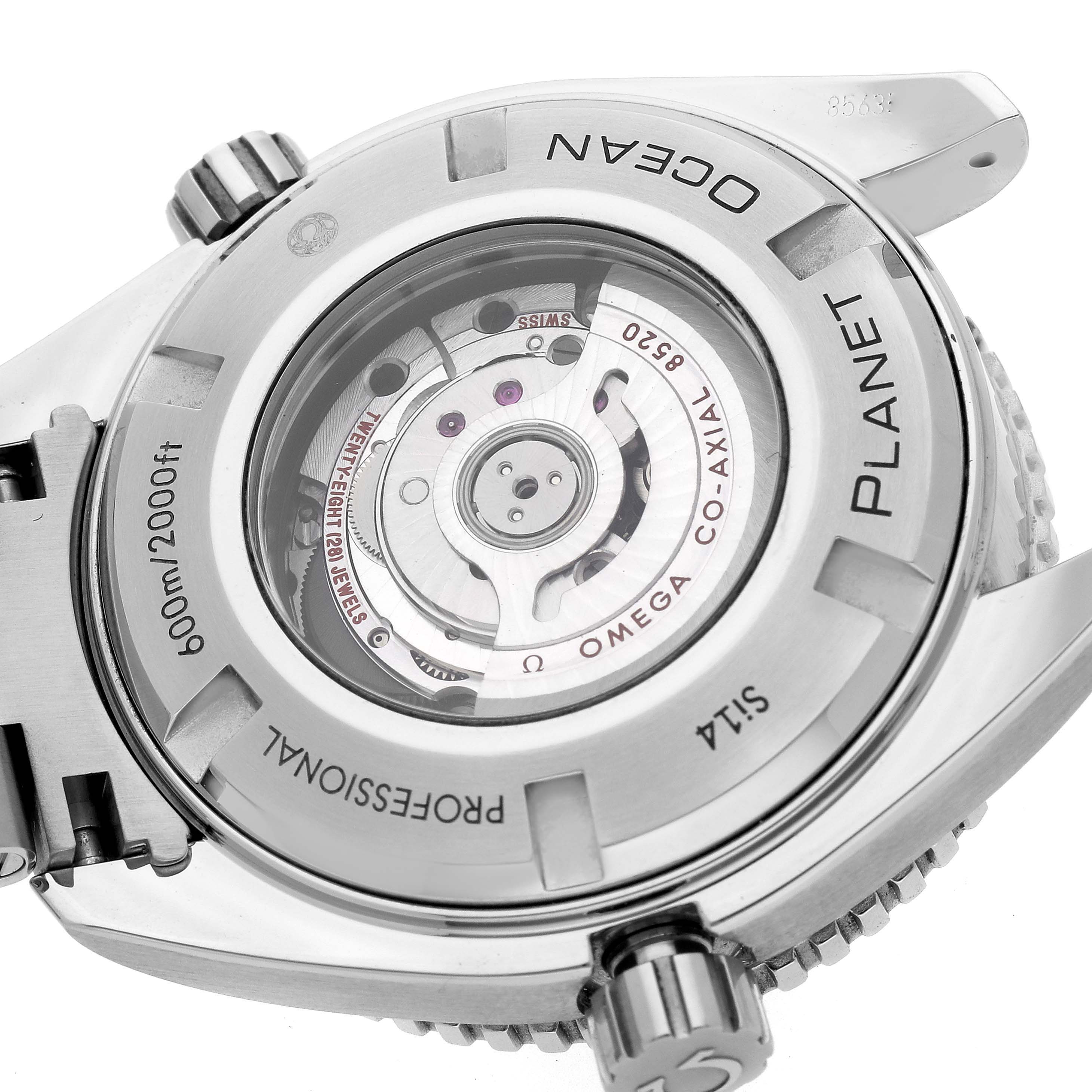 The image shows the back view of the Omega Planet Ocean 232.30.38.20.01.001 Men
s Stainless Steel Black Dial 232.30.38.20.01.001 Men
s Stainless Steel Black Dial watch, displaying its Co-Axial movement and serial details.