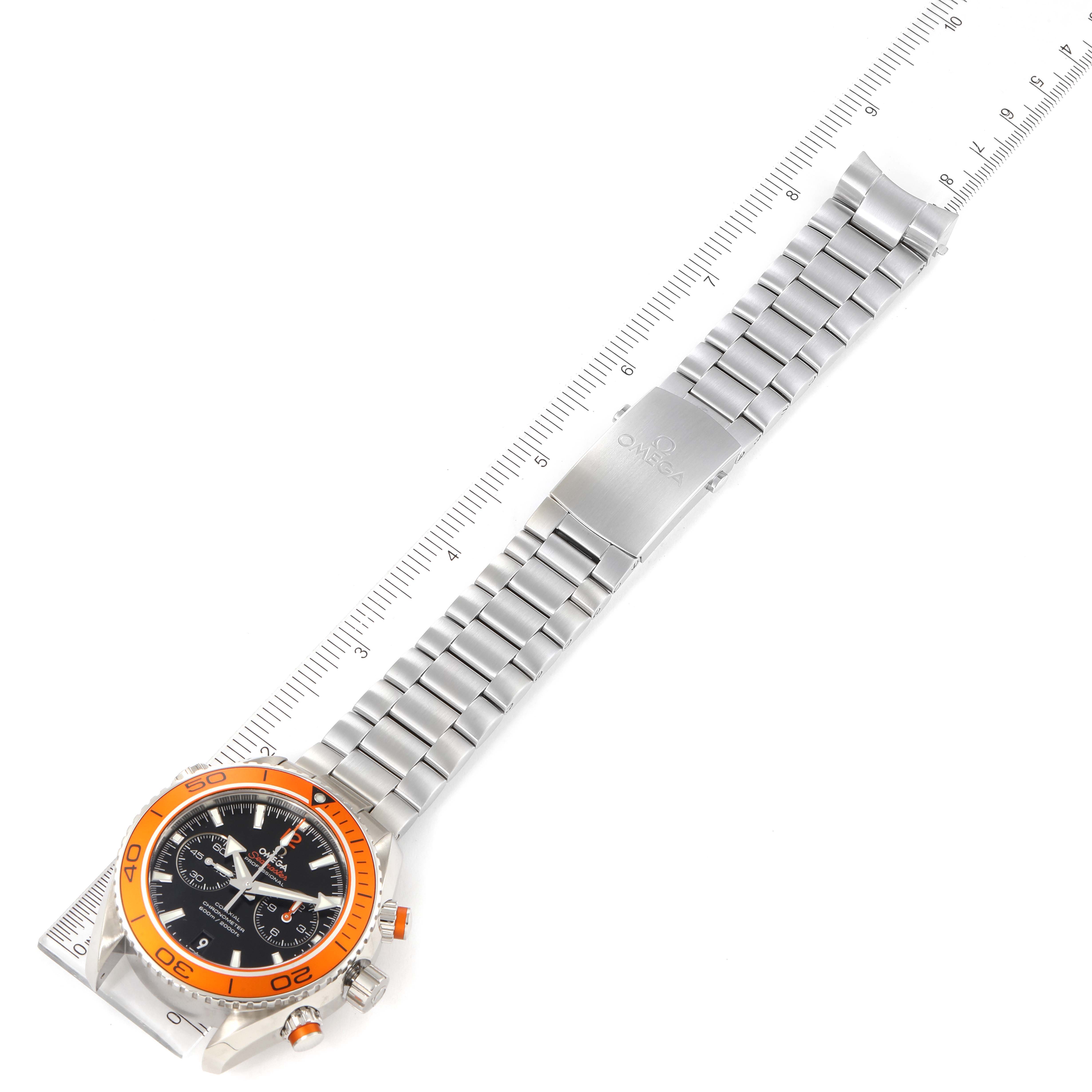 The Omega Planet Ocean 232.30.46.51.01.002 Men
s Stainless Steel Black Dial 232.30.46.51.01.002 Men
s Stainless Steel Black Dial watch is shown at a diagonal angle with a stainless steel bracelet and an orange bezel.