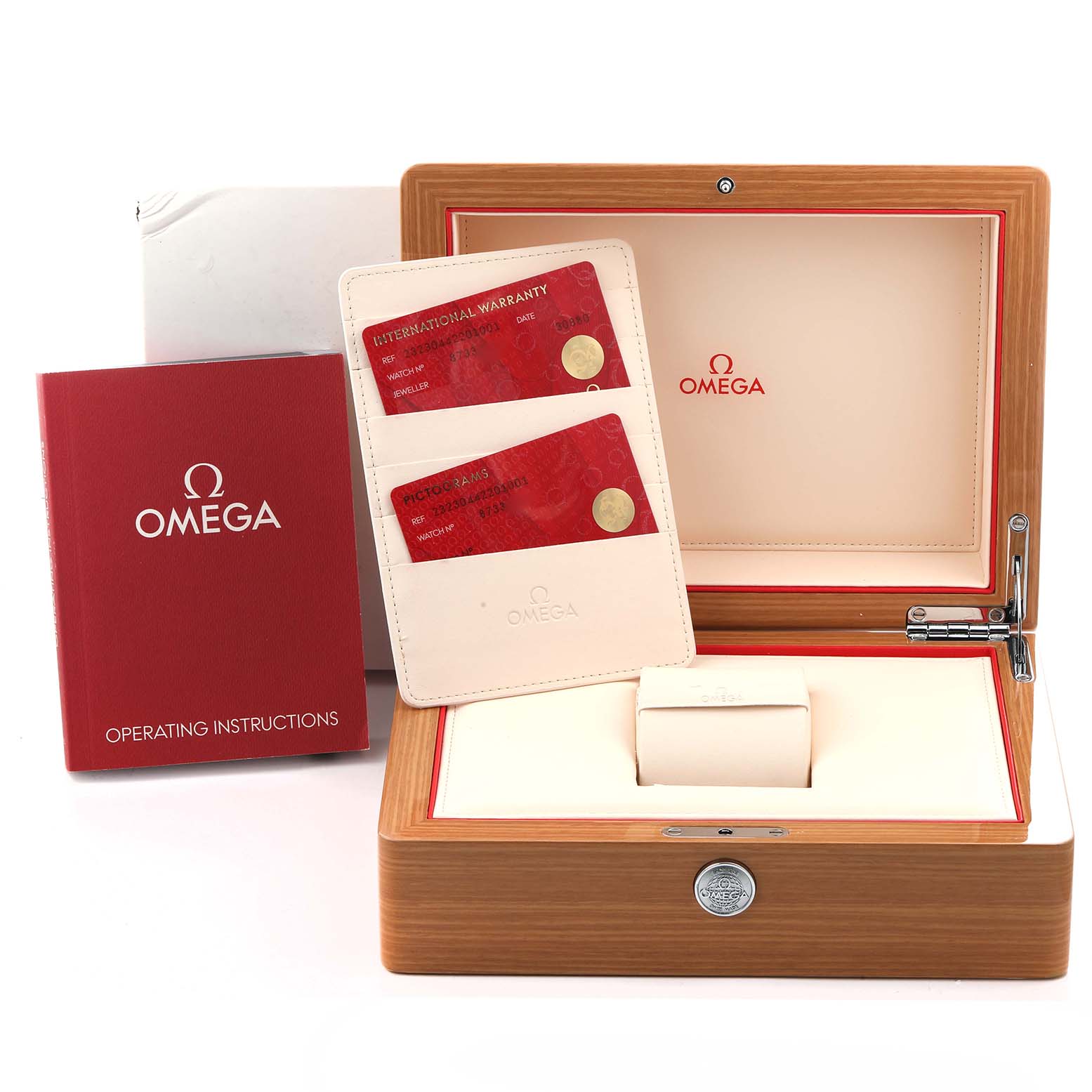 The image shows the Omega Planet Ocean 232.30.44.22.01.001 Men
s Stainless Steel Black Dial 232.30.44.22.01.001 Men
s Stainless Steel Black Dial watch box, instruction booklet, warranty cards, and their holder.