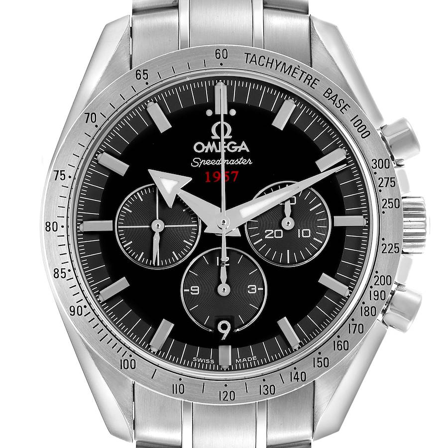 The Omega Speedmaster watch is shown from the front, highlighting its tachymeter bezel, subdials, and stainless steel case.