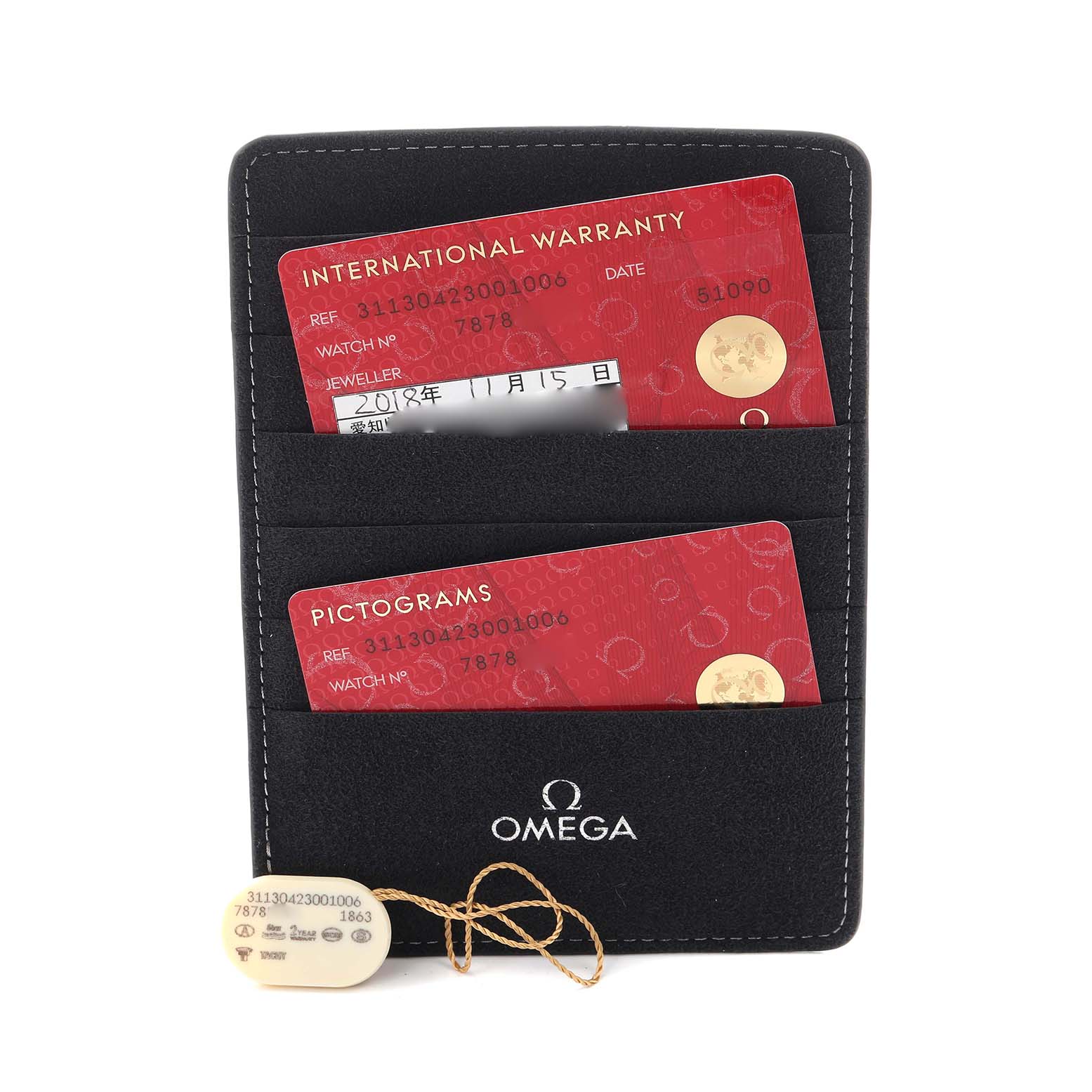 The image shows Omega Speedmaster 311.30.42.30.01.006 Men's Stainless Steel Black Dial 311.30.42.30.01.006 Men's Stainless Steel Black Dial warranty cards and a pictogram card in a black holder with a hang tag.