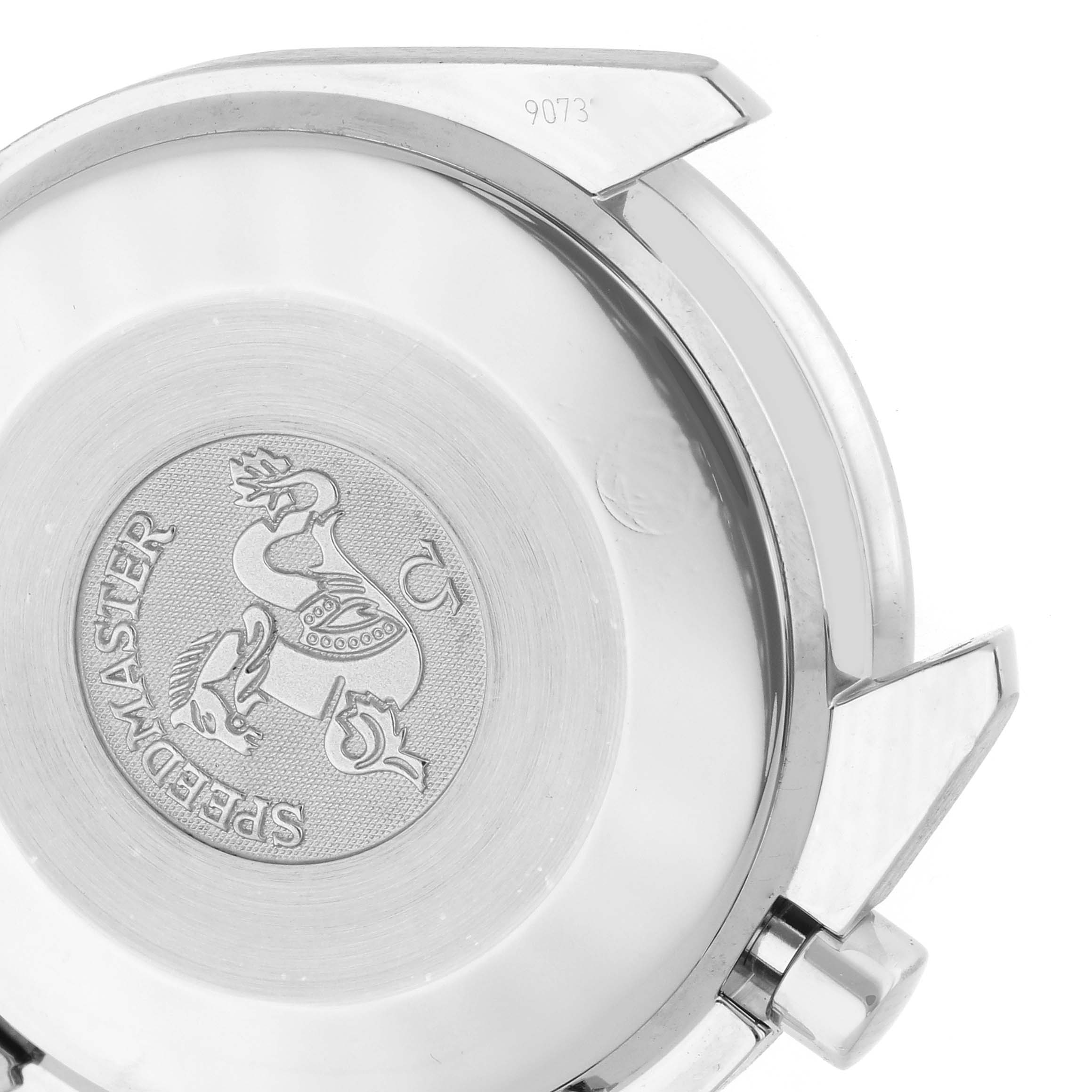 The image shows the back case of an Omega Speedmaster 3539.50.00 Men
s Stainless Steel Black Dial 3539.50.00 Men
s Stainless Steel Black Dial watch, detailing the engraved logo and case shape.