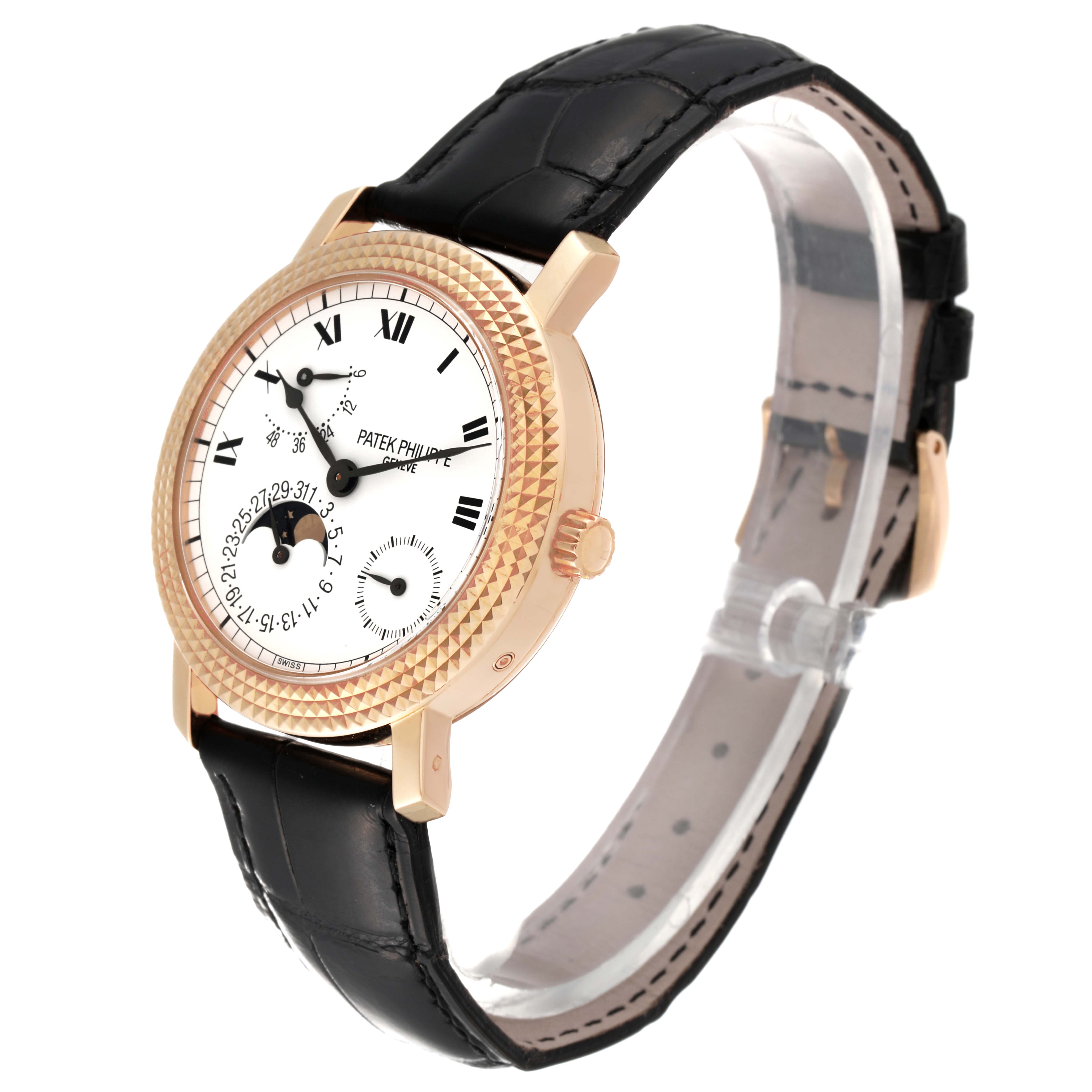 This image shows a Patek Philippe Calatrava 5057R Men's Rose Gold White Dial 5057R Men's Rose Gold White Dial model watch at a 3/4 angle highlighting its face, bezel, and leather strap.