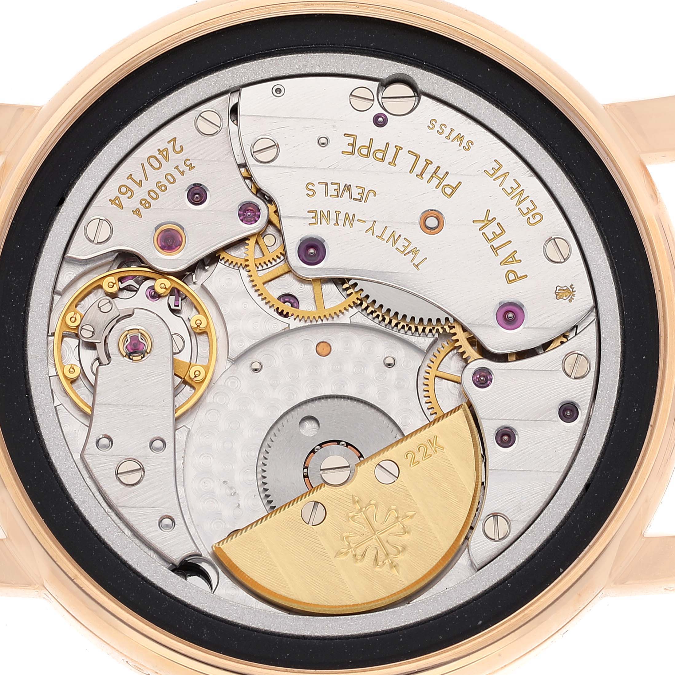 The image shows the back view of the movement mechanism of a Patek Philippe Calatrava 5057R Men's Rose Gold White Dial 5057R Men's Rose Gold White Dial watch.