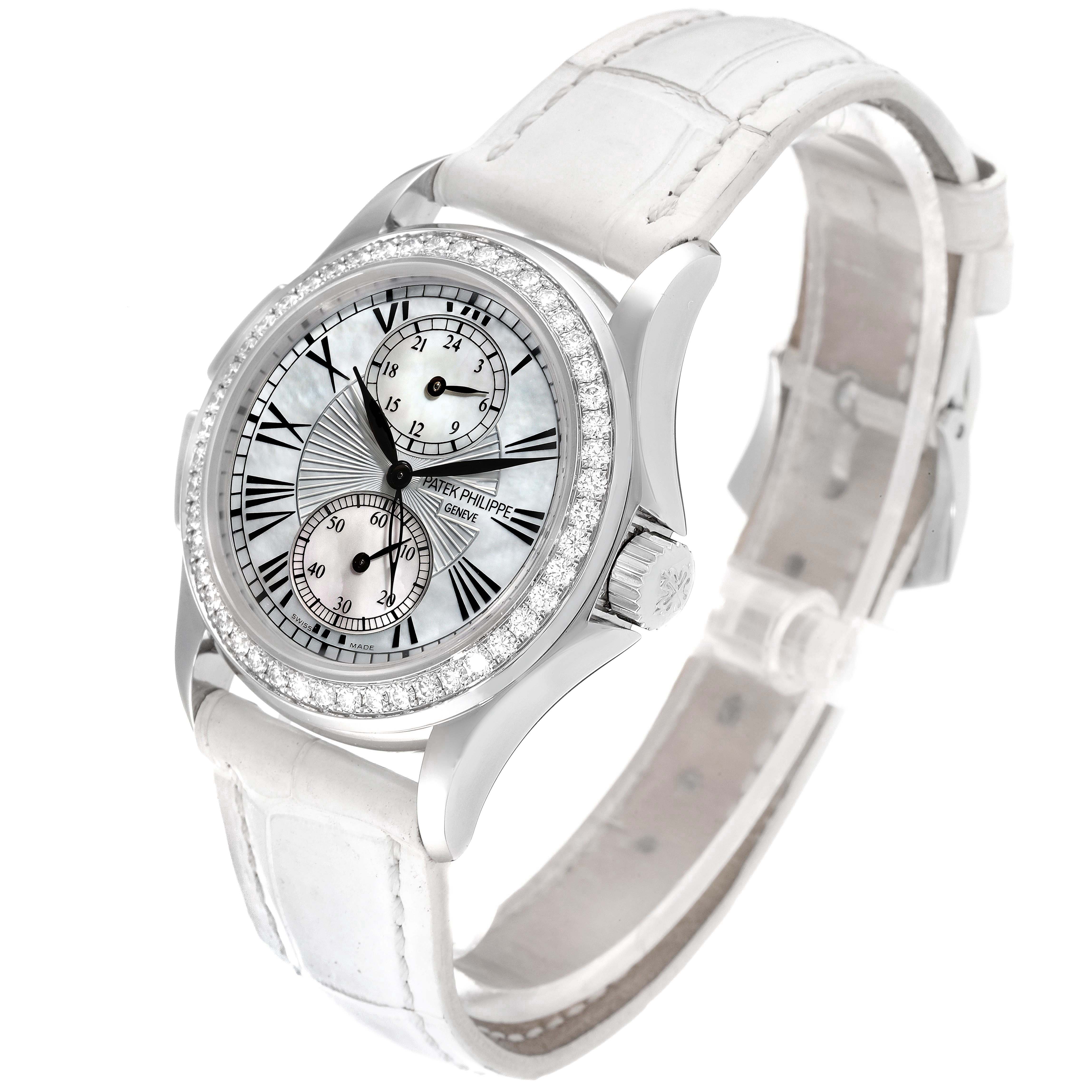 The image showcases a Patek Philippe Calatrava 4934G Women
s White Gold Mother of Pearl Dial 4934G Women
s White Gold Mother of Pearl Dial watch at a slight angle, highlighting the face, bezel, and white leather strap.