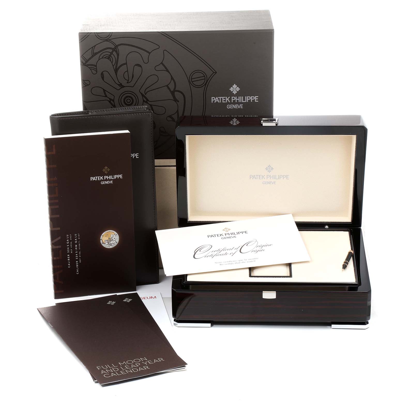 The image shows the packaging, presentation box, and accompanying documents for the Patek Philippe 5146R Men's Rose Gold Beige Dial 5146R Men's Rose Gold Beige Dial Complicated Annual Calendar Rose Gold Watch 5146.