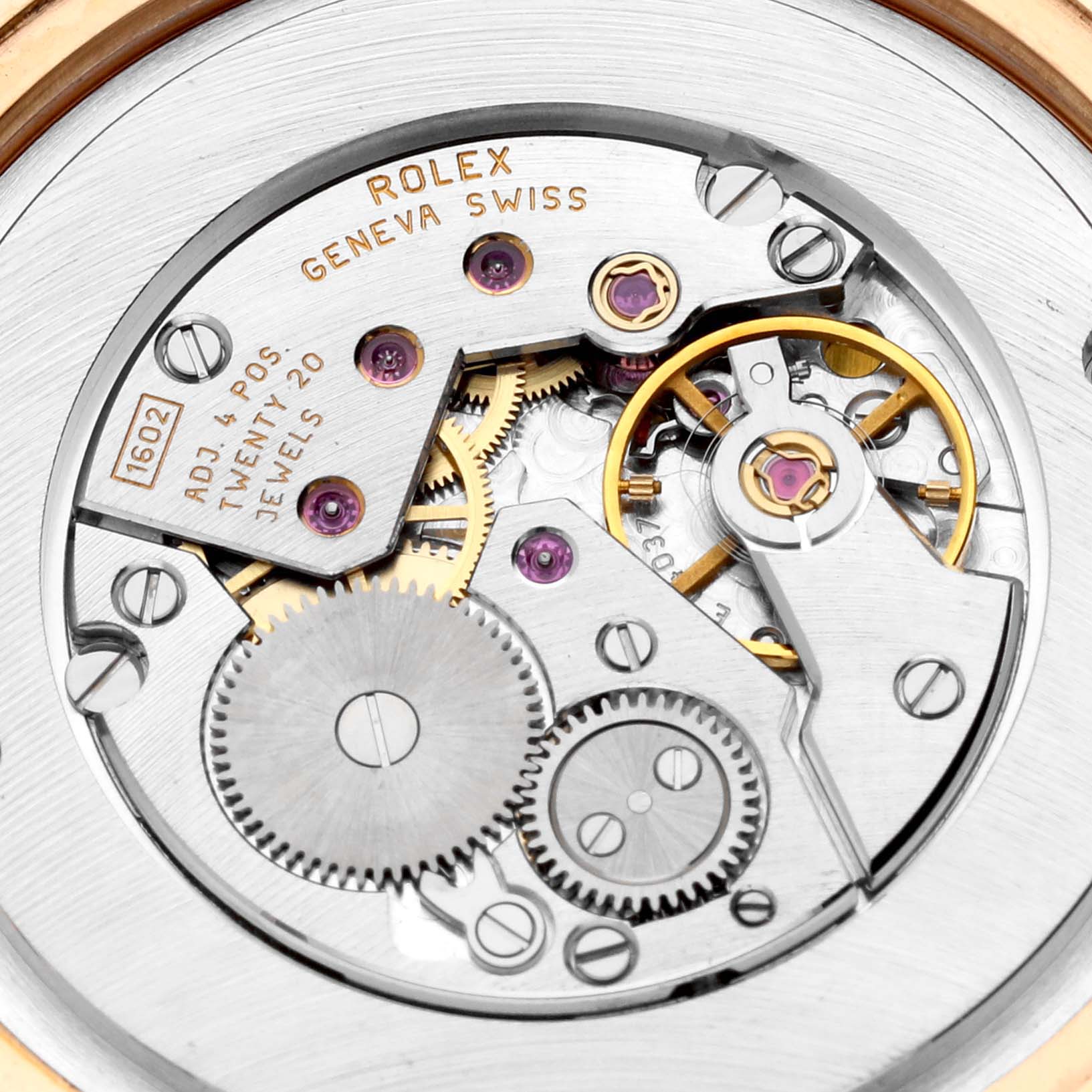 This is a close-up view of the movement mechanism inside a Rolex Cellini 5330 Men's Rose Gold White Dial 5330 Men's Rose Gold White Dial watch, highlighting gears and jewels. 