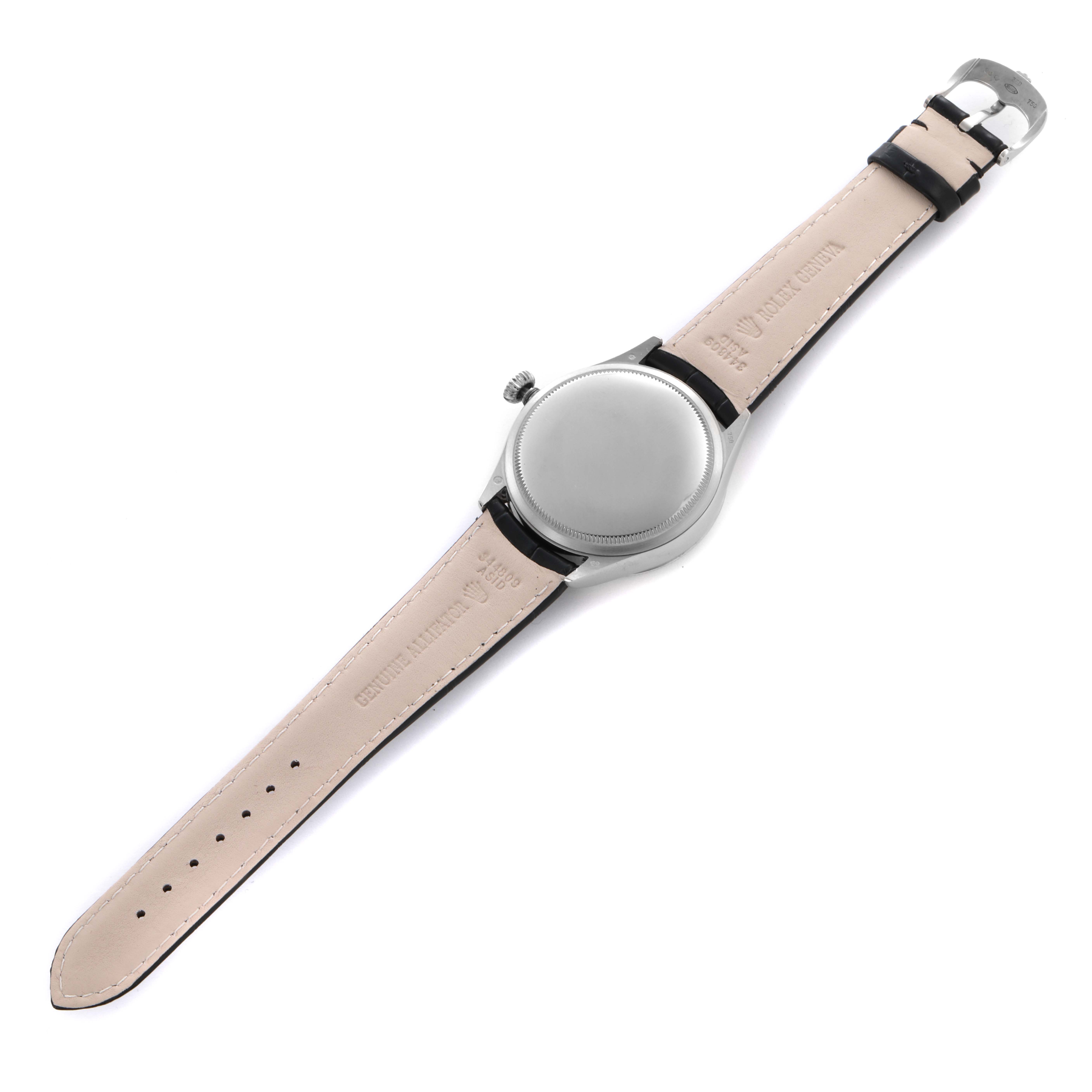 The Rolex Cellini 50529 Men's White Gold Black Dial 50529 Men's White Gold Black Dial watch is shown from the back, displaying its case, crown, and leather strap.