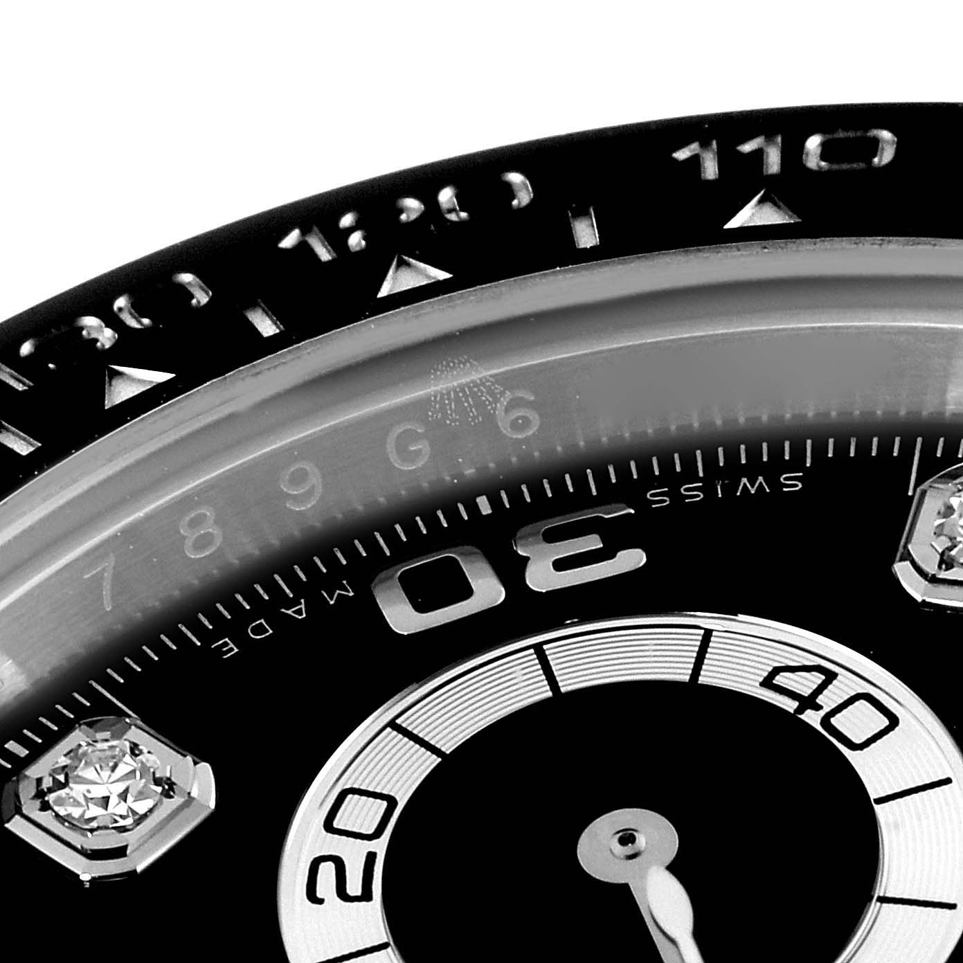 This image shows a close-up view of the dial and bezel of a Rolex Daytona 116519 Men
s White Gold Black Dial 116519 Men
s White Gold Black Dial watch.