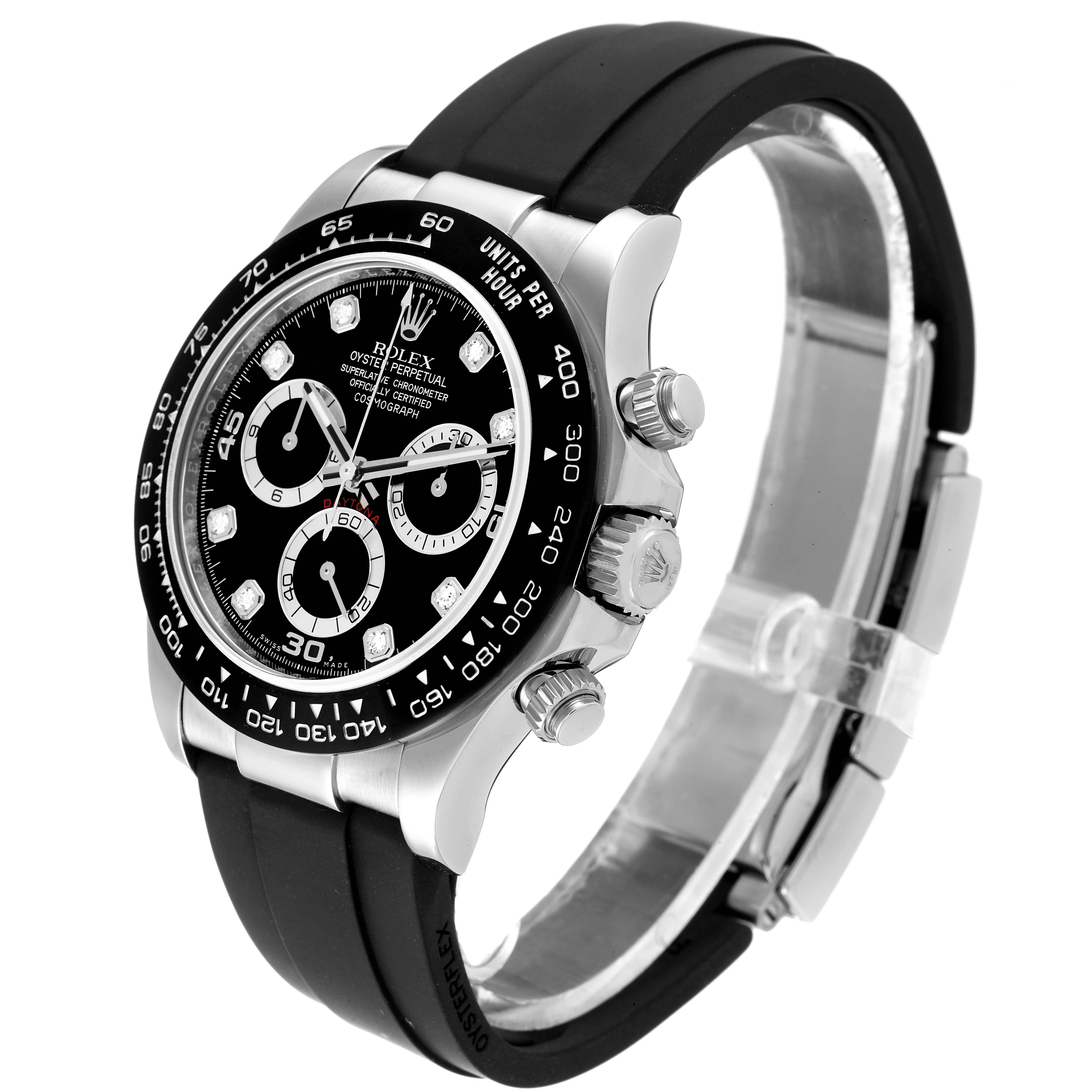 The image shows a side angle of a Rolex Daytona 116519 Men
s White Gold Black Dial 116519 Men
s White Gold Black Dial watch, highlighting its dial, bezel, crown, and pushers.