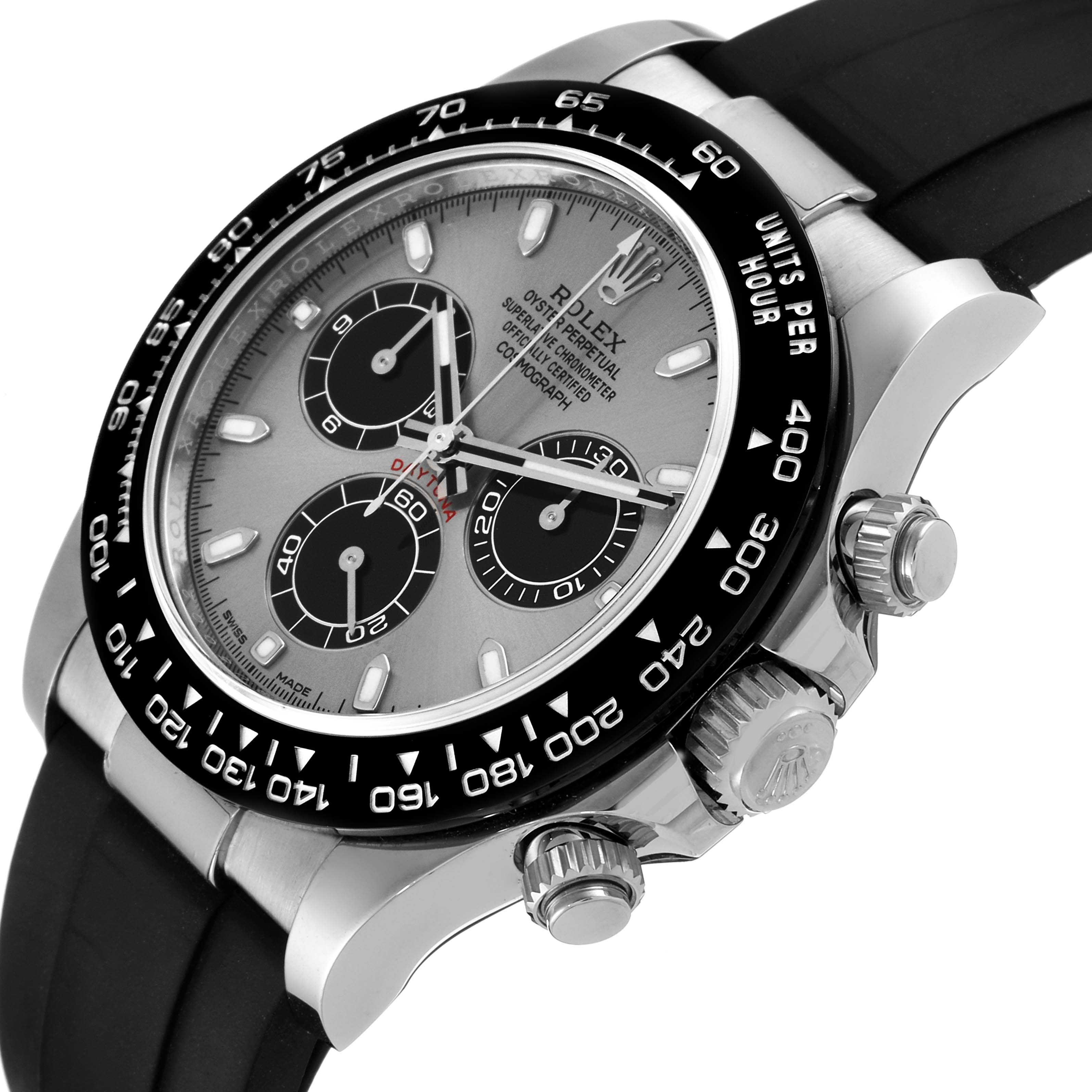 The Rolex Daytona 116519 Men's White Gold Grey Dial 116519 Men's White Gold Grey Dial watch is shown from a side angle, highlighting its bezel, crown, pushers, and part of the strap.