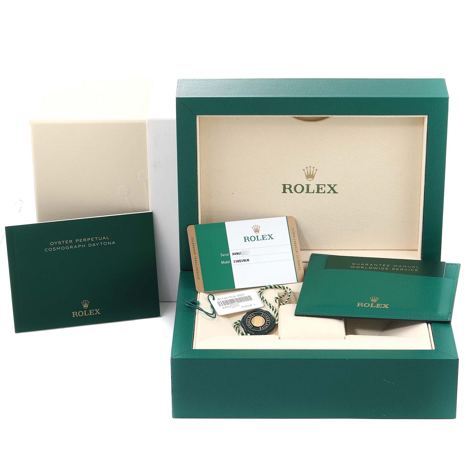 The image shows the packaging and accessories for a Rolex Daytona 116519 Men's White Gold Grey Dial 116519 Men's White Gold Grey Dial watch, including the box, warranty card, manual, and tags.