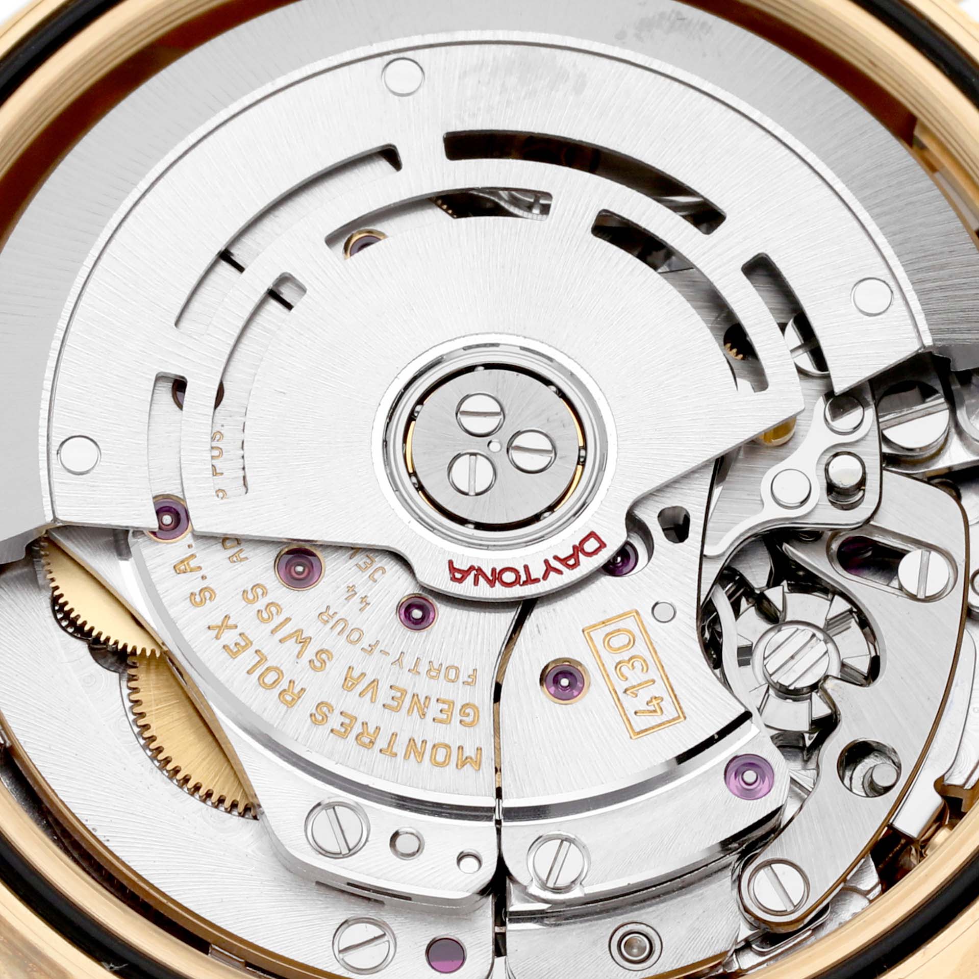 This close-up shows the internal mechanism of a Rolex Daytona 116528 Men's Yellow Gold Black Dial 116528 Men's Yellow Gold Black Dial watch, highlighting the intricate movement parts.