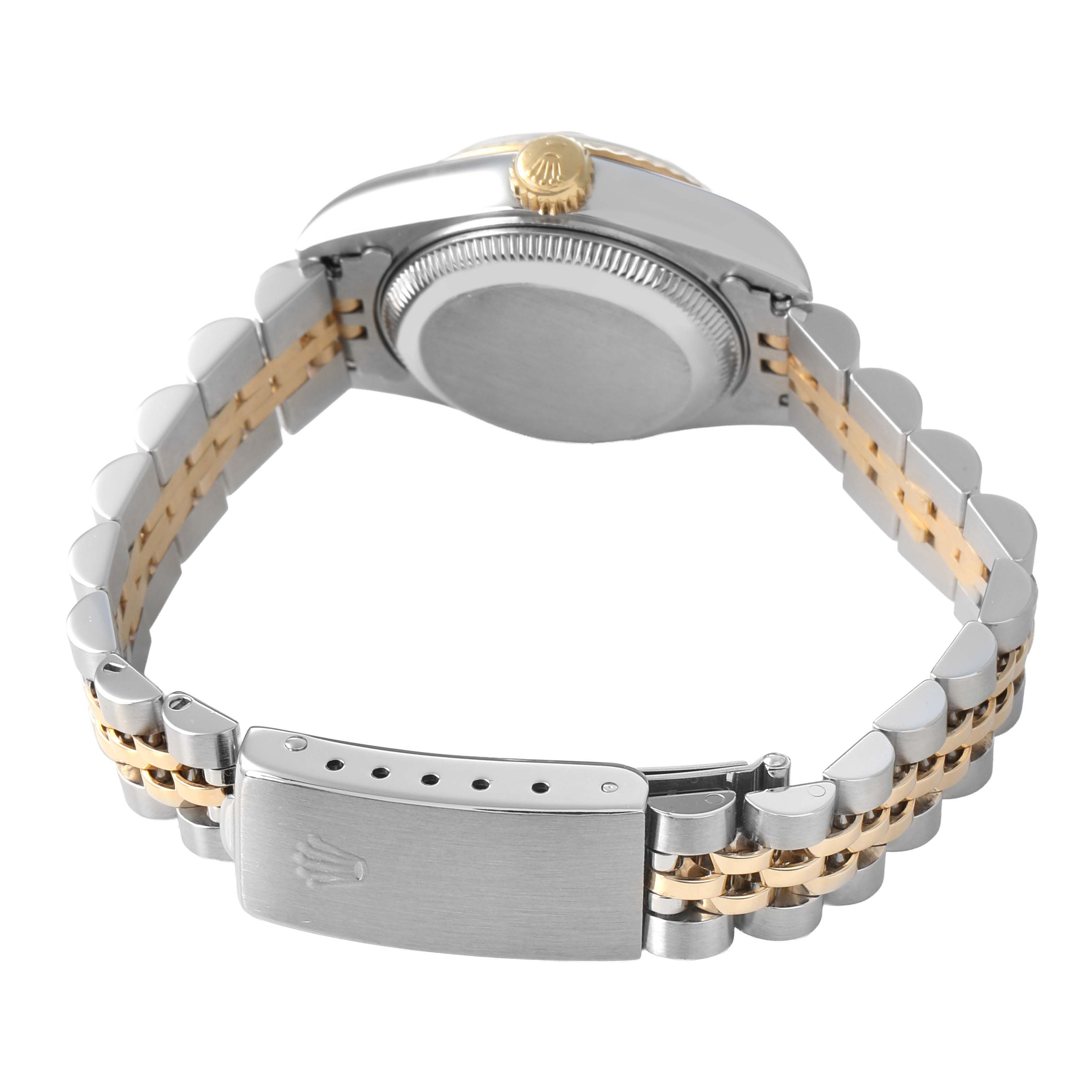 The image displays the back view of a Rolex Datejust 69173 Women's Steel and Gold (two tone) Champagne Dial watch, showing the clasp, case back, and bracelet.