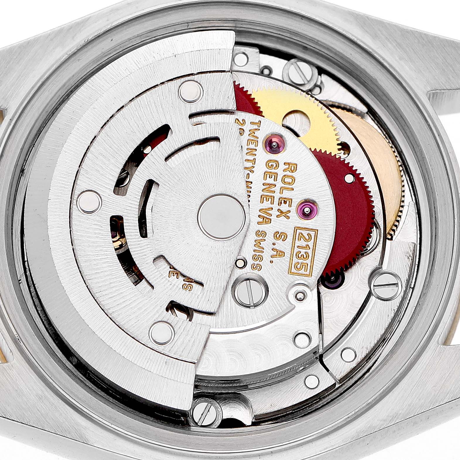 The image shows the movement mechanism of a Rolex Datejust 69173 Women's Steel and Gold (two tone) Champagne Dial watch from a rear view, highlighting gears and inscriptions.