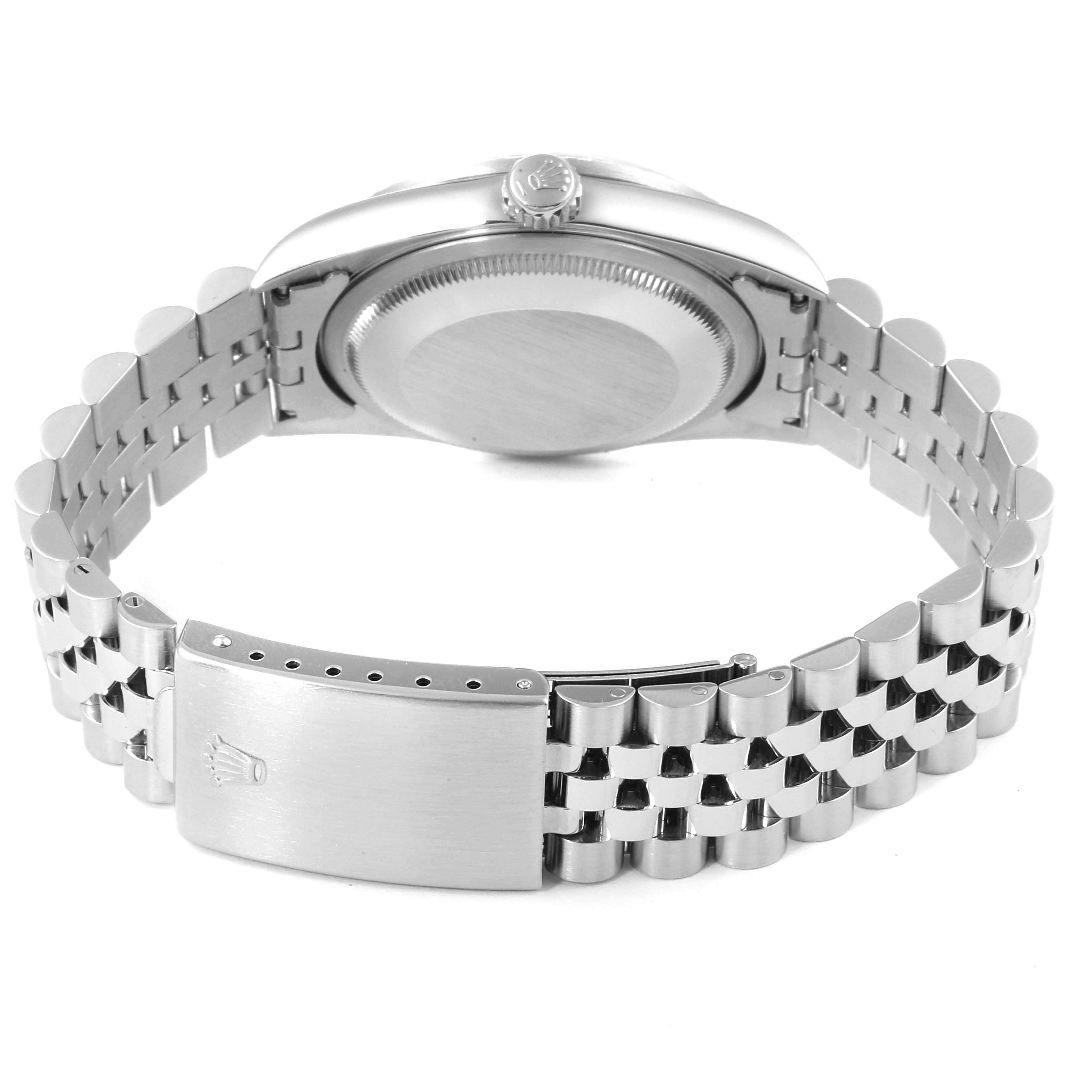 This image shows the back view of a Rolex Datejust 16220 Men
s Stainless Steel Pink Dial 16220 Men
s Stainless Steel Pink Dial watch, highlighting its case back and jubilee bracelet with a clasp.