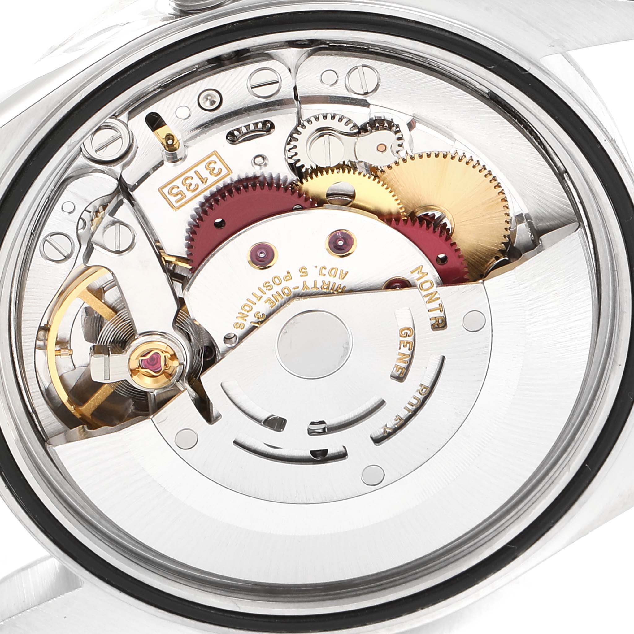 This image shows a detailed close-up of the internal movement of a Rolex Datejust 16220 Men
s Stainless Steel Pink Dial 16220 Men
s Stainless Steel Pink Dial watch.