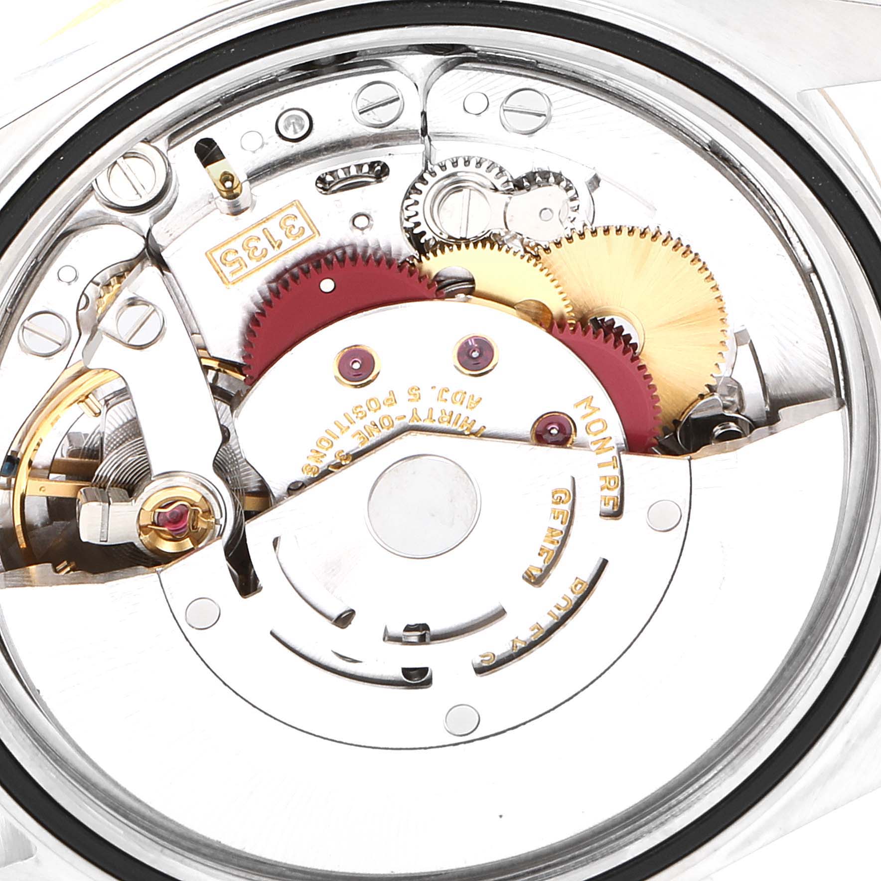 This is a close-up view of the internal movement mechanism of a Rolex Datejust 16203 Men's Steel and Gold (two tone) Grey Dial 16203 Men's Steel and Gold (two tone) Grey Dial watch, showcasing its gears and components.