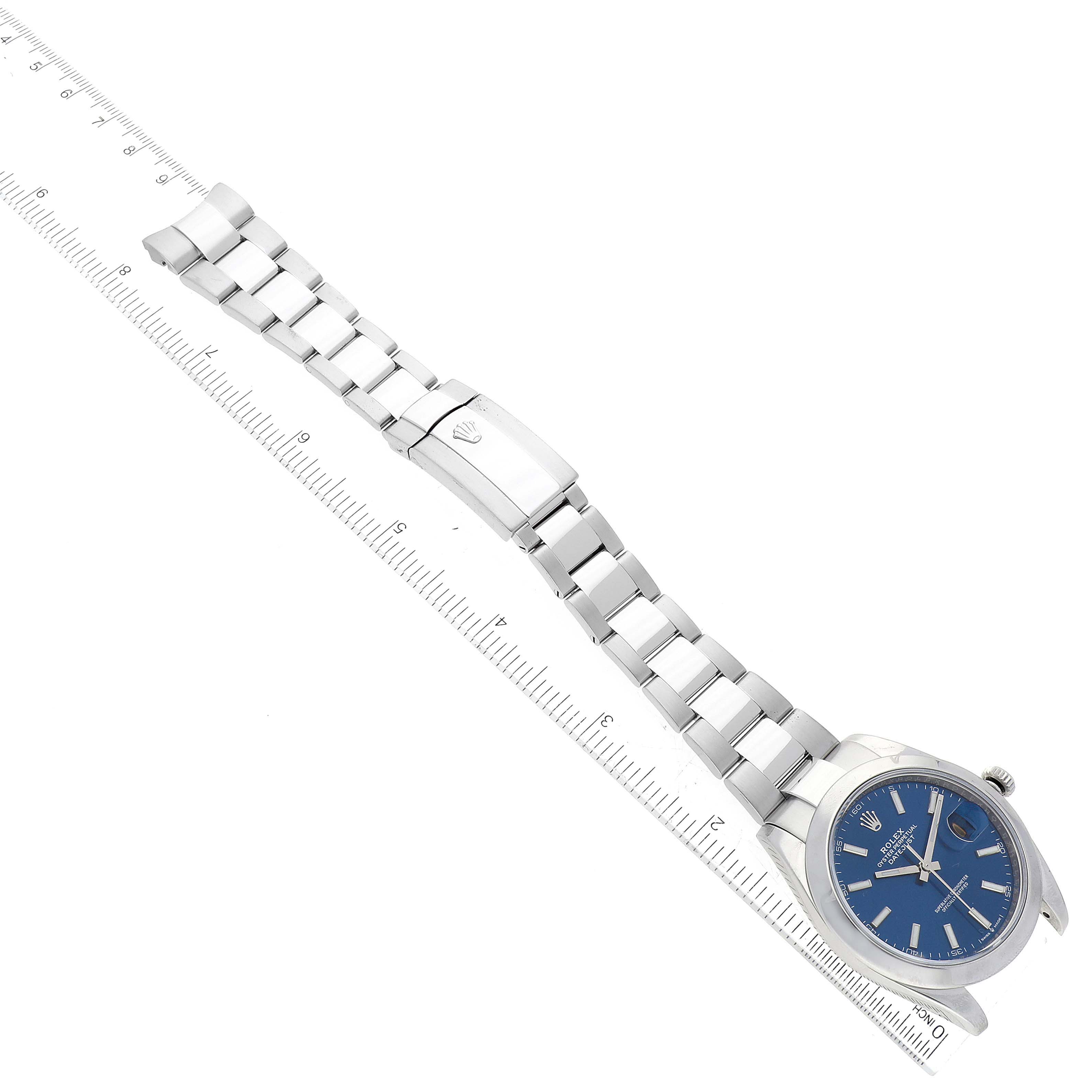 The image shows a top-down view of a Rolex Datejust 41 126300 Men's Stainless Steel Blue Dial 126300 Men's Stainless Steel Blue Dial watch with a blue dial and oyster bracelet fully extended.