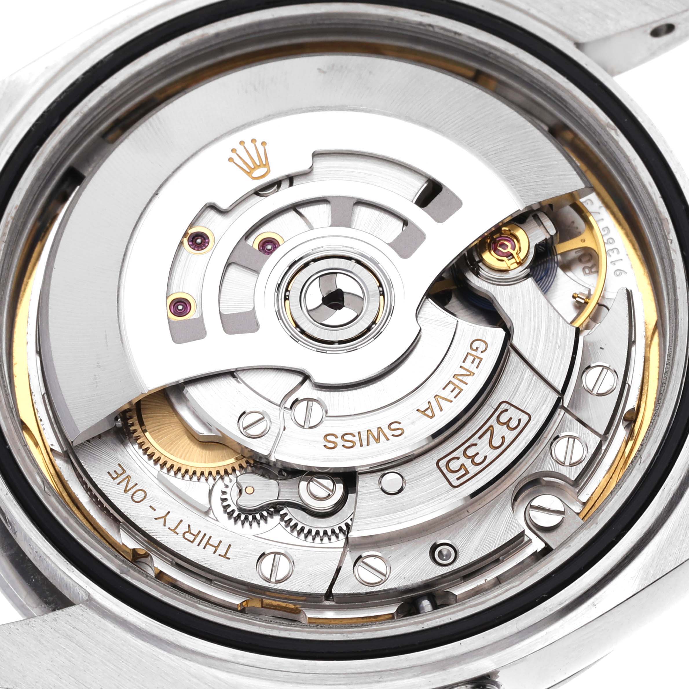 This image shows a close-up of the movement and internal mechanics of the Rolex Datejust 41 126300 Men's Stainless Steel Blue Dial 126300 Men's Stainless Steel Blue Dial timepiece.