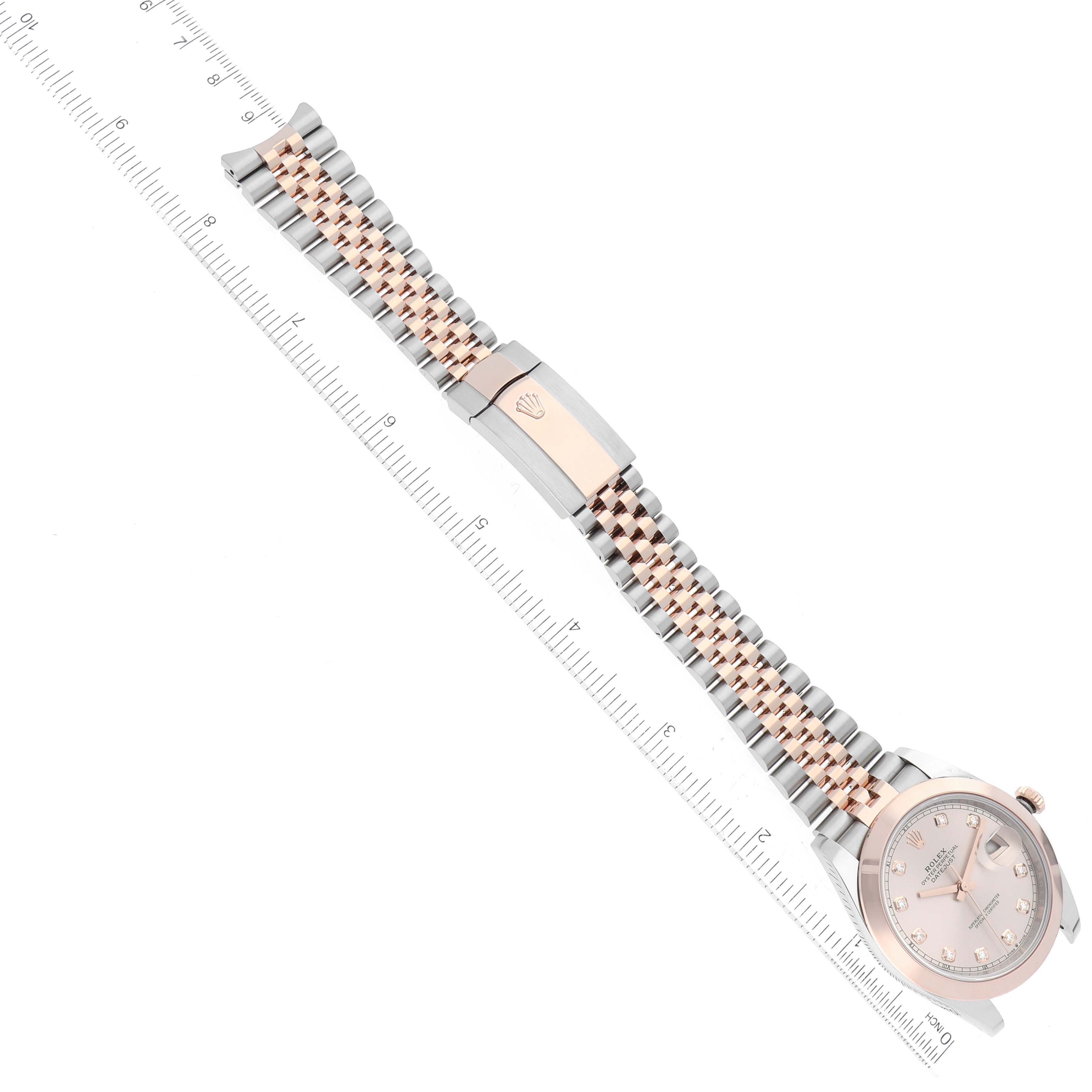 This image shows a top-down view of a Rolex Datejust 41 126301 Men
s Steel and Gold (two tone) Pink Dial 126301 Men
s Steel and Gold (two tone) Pink Dial watch, highlighting the face and the Jubilee bracelet.