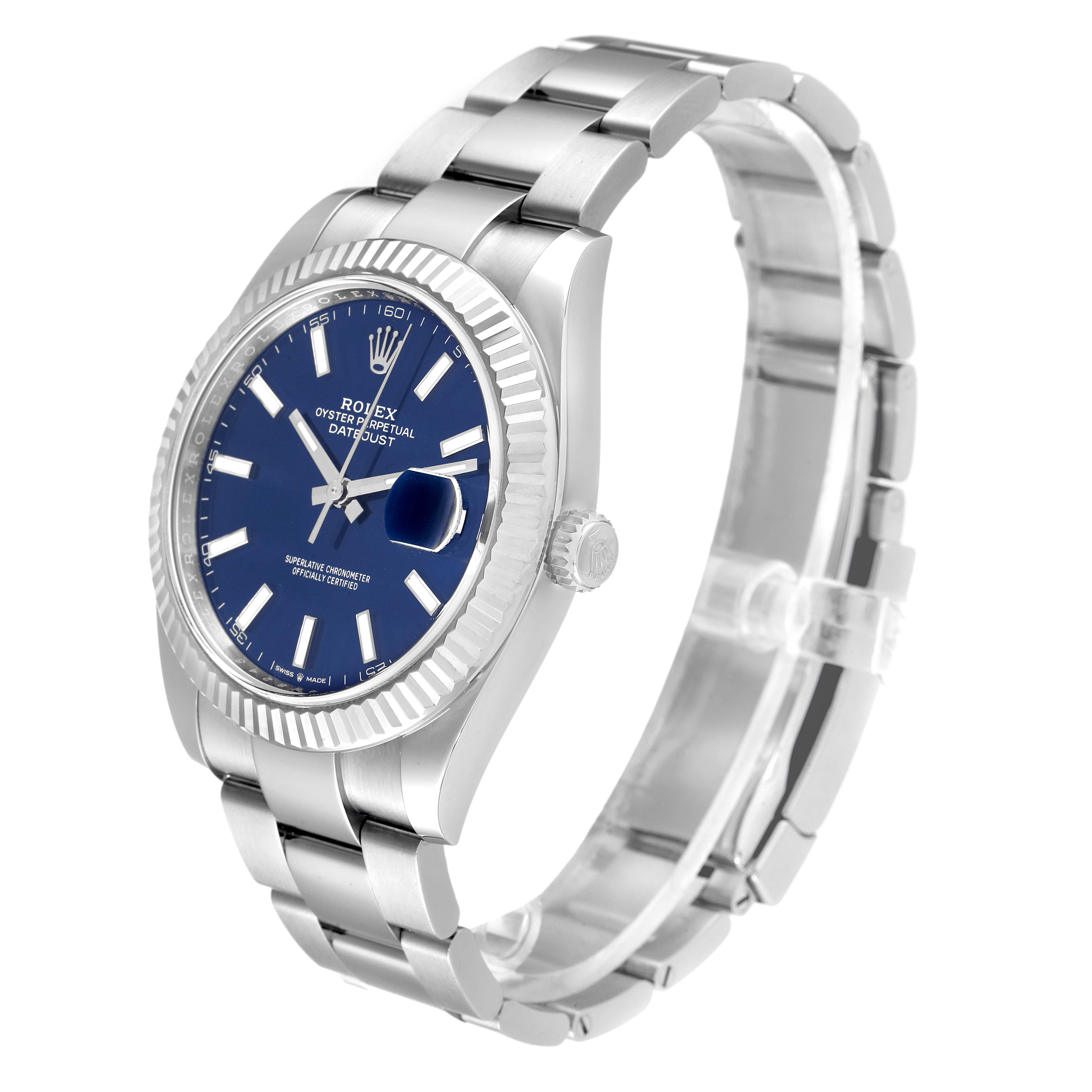 The image shows a Rolex Datejust 41 126334 Men
s Stainless Steel Blue Dial 126334 Men
s Stainless Steel Blue Dial watch at an angled side view, highlighting its blue dial, fluted bezel, and stainless steel bracelet.