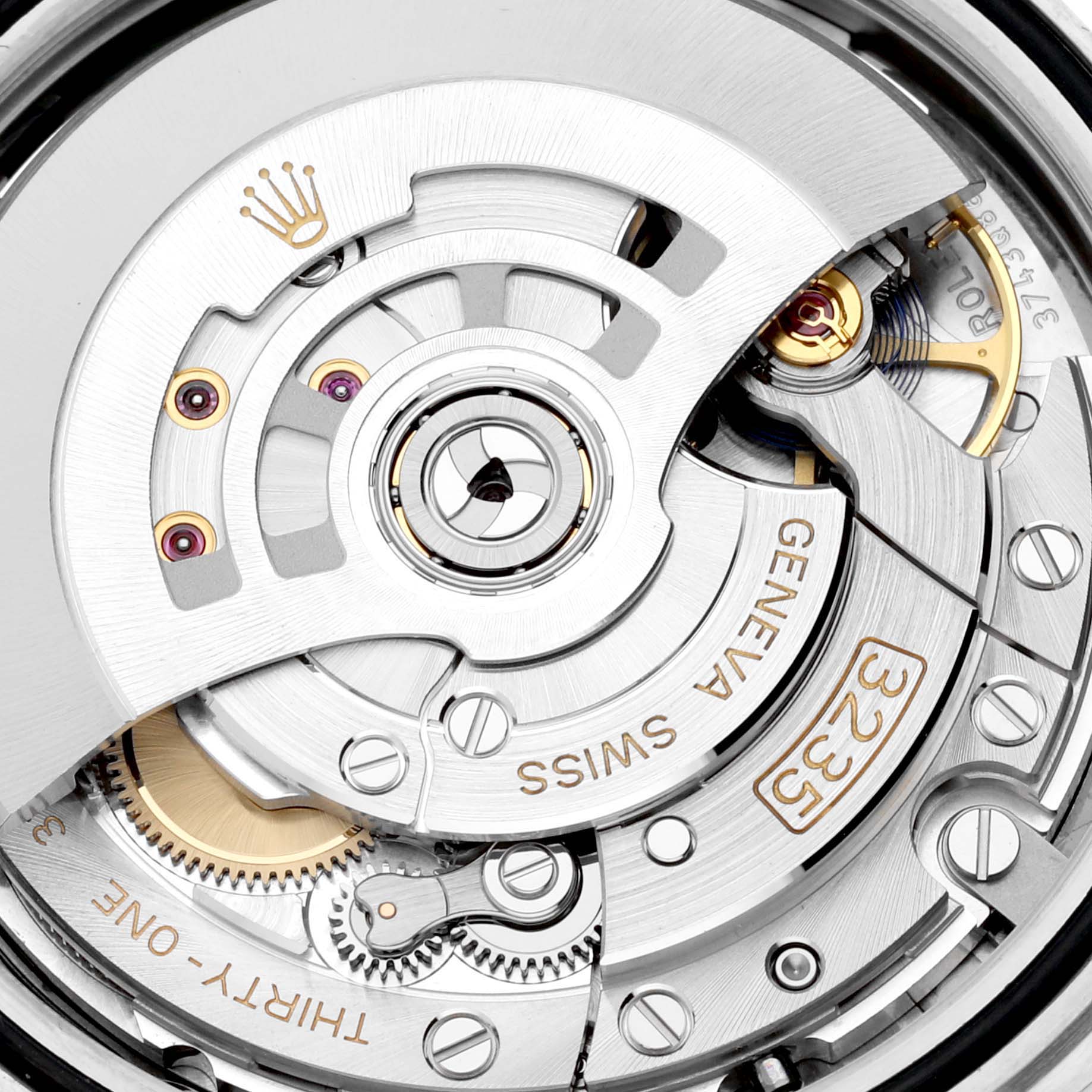 This image shows the intricate movement and internal mechanism of the Rolex Datejust 41 126333 Men's Steel and Gold (two tone) Grey Dial 126333 Men's Steel and Gold (two tone) Grey Dial model watch.