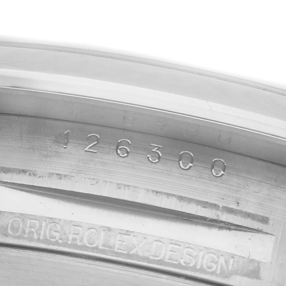 The image shows the inner bezel of a Rolex Datejust 41 126300 Men's Stainless Steel White Dial 126300 Men's Stainless Steel White Dial, highlighting the engraved model number and "Orig. Rolex Design".