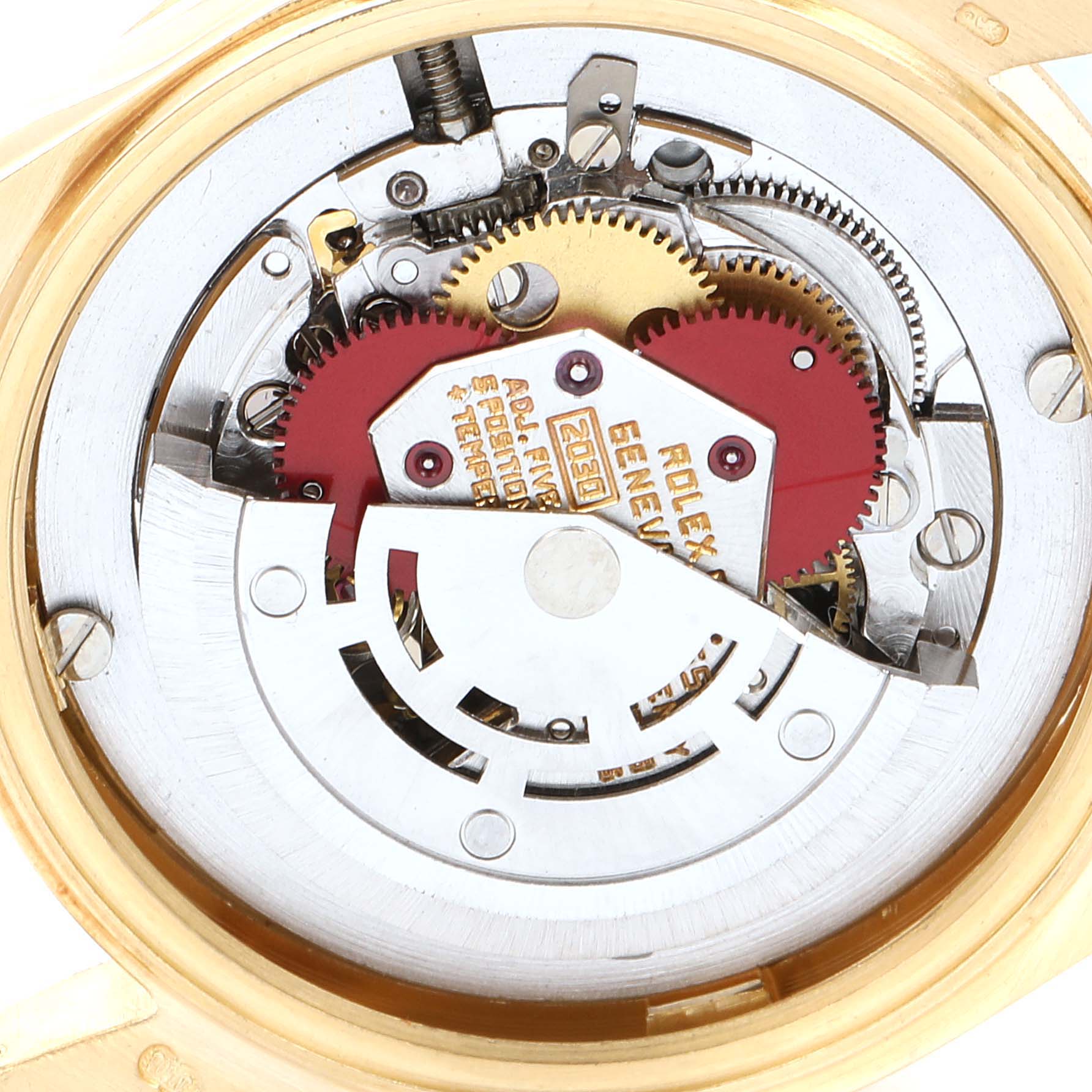 The image shows the internal components of a Rolex President 6827 Women's Yellow Gold White Dial 6827 Women's Yellow Gold White Dial model watch, highlighting the movement mechanism.