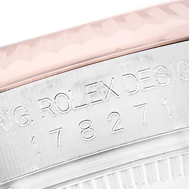 The image shows a close-up of the case side and bezel of a Rolex Mid-Size 178271 Women's Steel and Gold (two tone) Mother of Pearl Dial 178271 Women's Steel and Gold (two tone) Mother of Pearl Dial model, highlighting engraved text details.