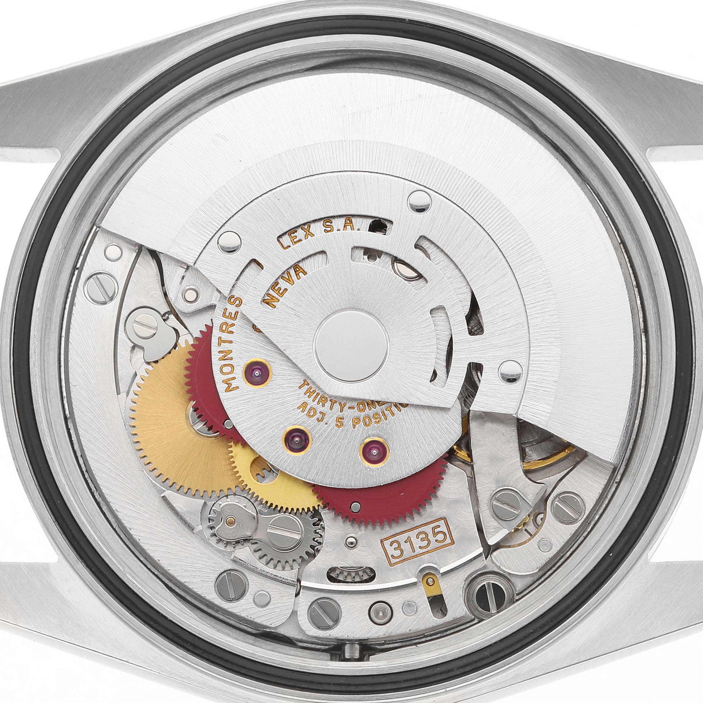 The image shows a detailed top-down view of the movement inside a Rolex Datejust 16220 Men's Stainless Steel Silver Dial, highlighting gears and components.