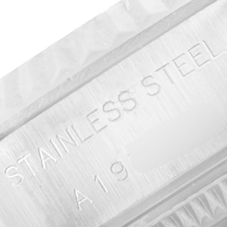 This image shows an up-close view of the stainless steel material stamp on a Rolex Datejust 79174 Women's Stainless Steel Silver Dial 79174 Women's Stainless Steel Silver Dial model.