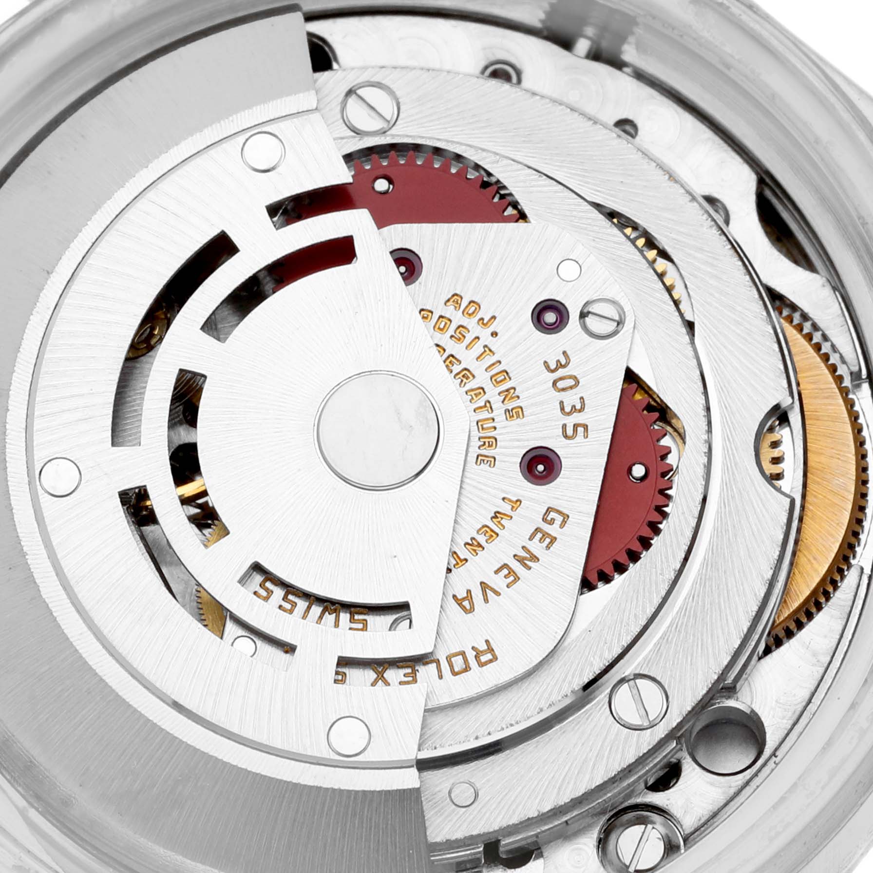 This image shows the detailed internal mechanism from the back of a Vintage Collection Rolex watch, clearly displaying the movement and gears.