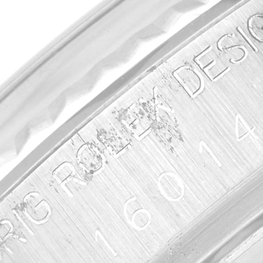 This close-up image shows the engraved model and design numbers on the case side of a Rolex Vintage Collection 16014 Men's Stainless Steel Silver Dial 16014 Men's Stainless Steel Silver Dial watch.