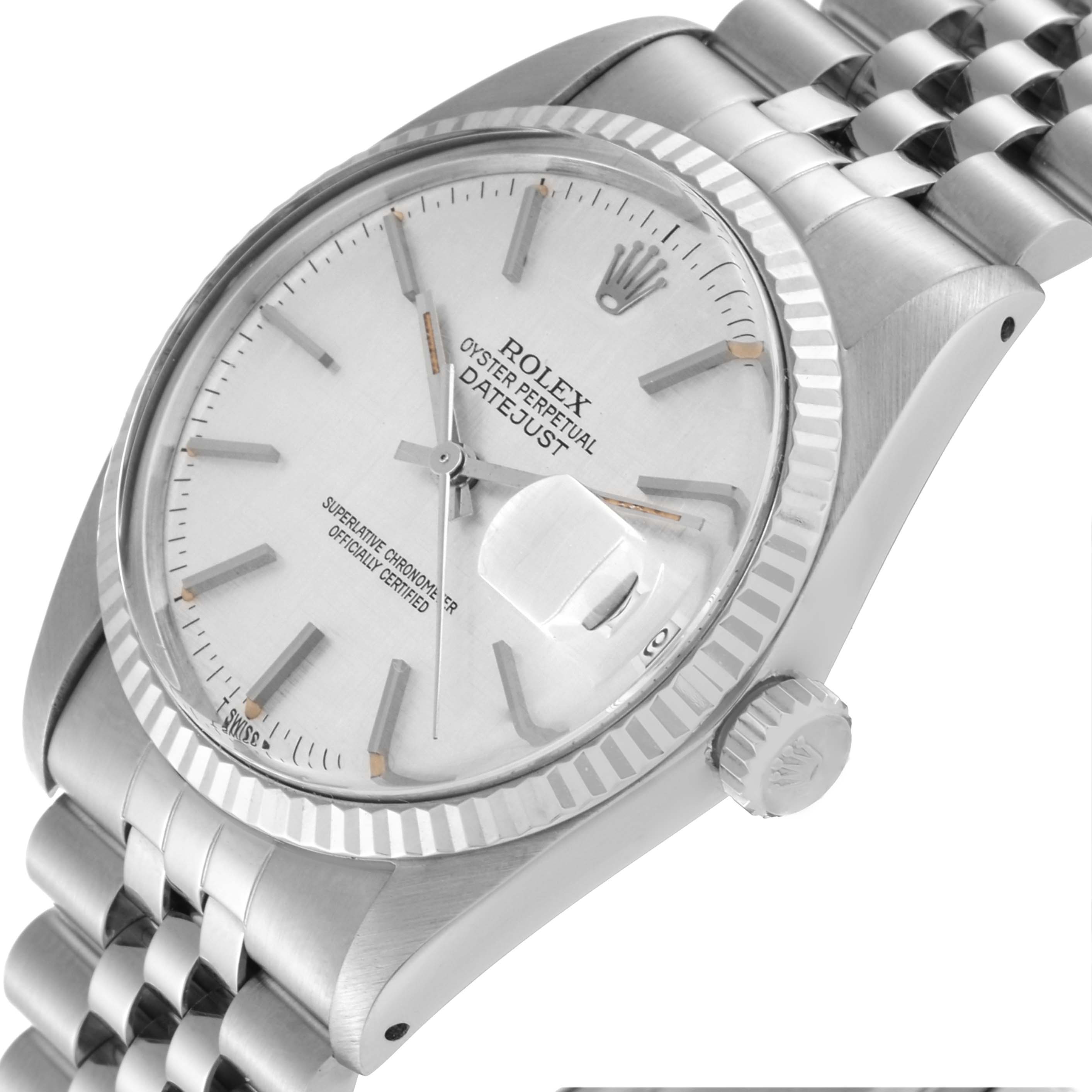 This is an angled view of the Rolex Vintage Collection 16014 Men's Stainless Steel Silver Dial 16014 Men's Stainless Steel Silver Dial Datejust watch, showing the dial, bezel, crown, and part of the bracelet.