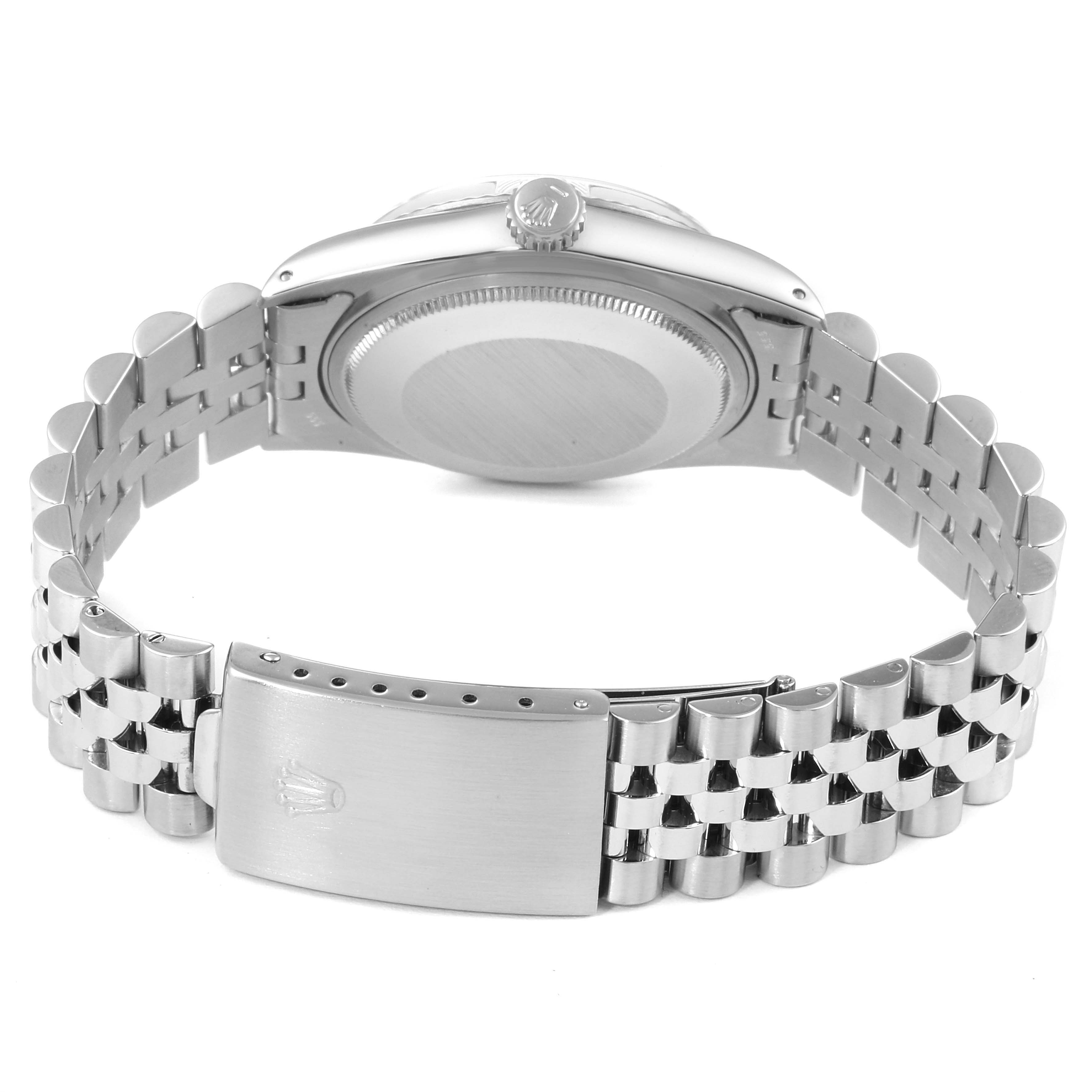 This image shows the back view of the Rolex Vintage Collection 16014 Men's Stainless Steel Silver Dial 16014 Men's Stainless Steel Silver Dial model, highlighting the case back and metal bracelet with clasp.