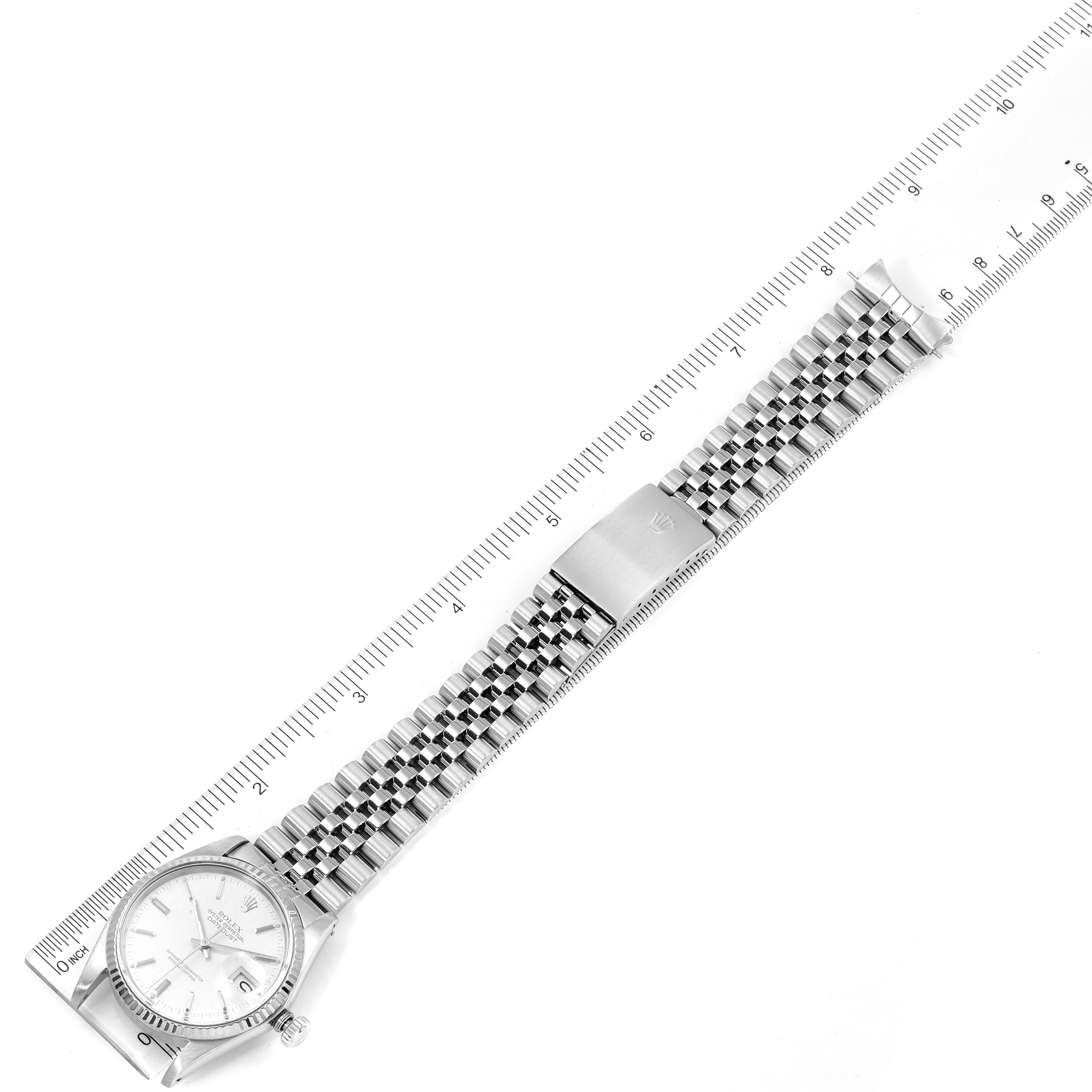 The image shows a top-down view of a Vintage Collection Rolex watch, displaying its dial, bracelet, and clasp with a ruler for scale.