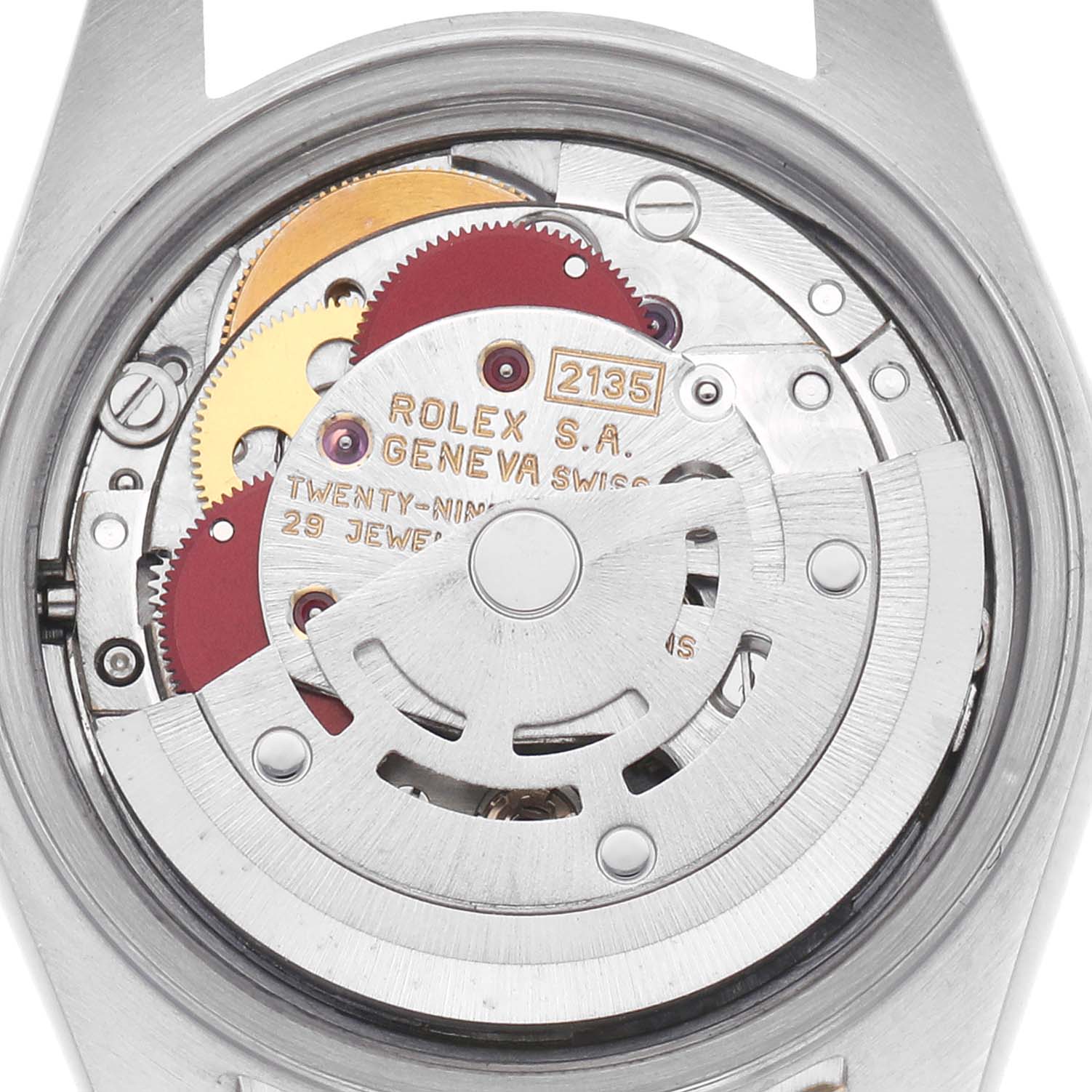 The image shows the movement of a Rolex Datejust 69173 Women
s Steel and Gold (two tone) Champagne Dial 69173 Women
s Steel and Gold (two tone) Champagne Dial watch, viewed from the back, displaying its intricate internal gears.