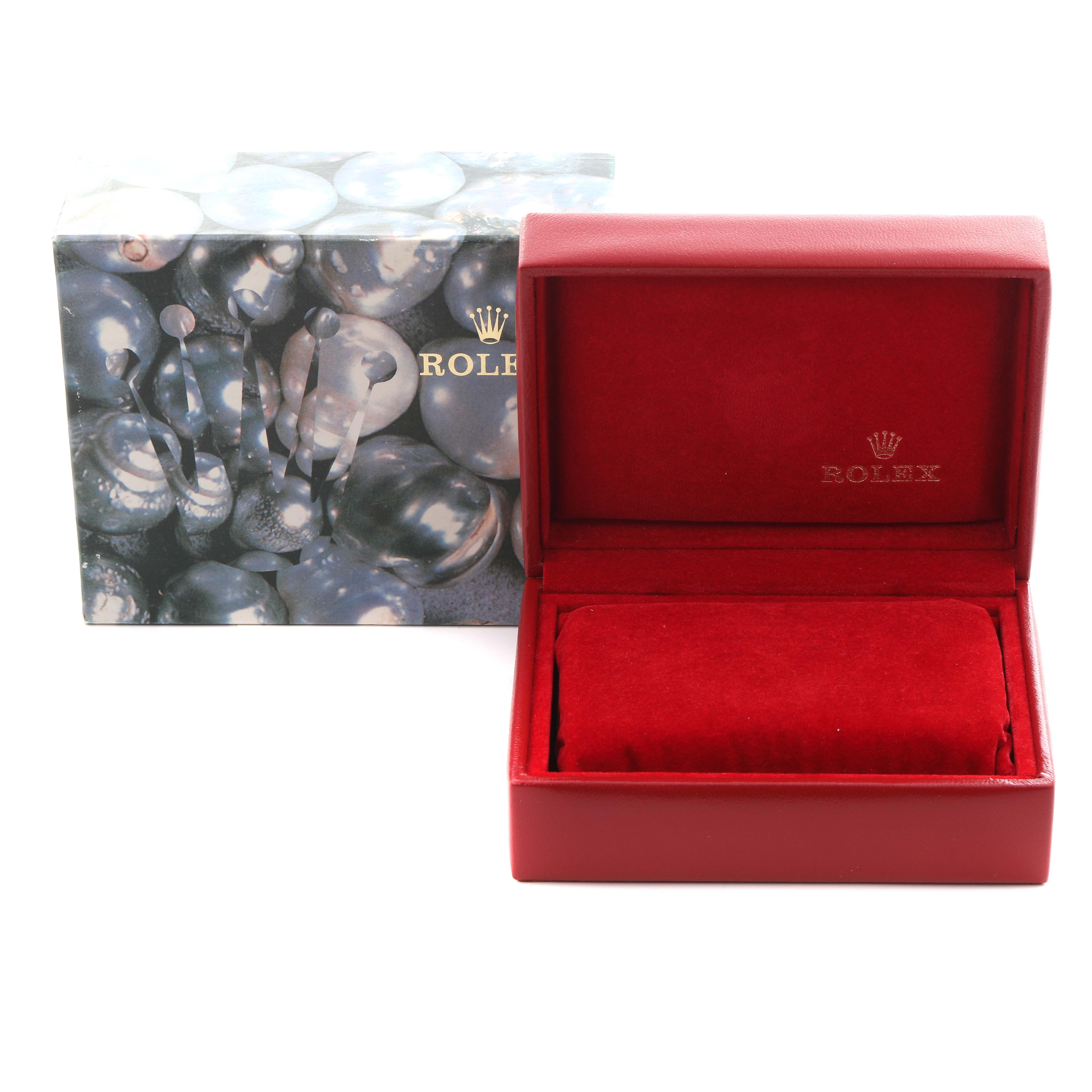 This image shows a Rolex Datejust 79173 Women's Steel and Gold (two tone) Champagne Dial 79173 Women's Steel and Gold (two tone) Champagne Dial model watch box and outer packaging, both featuring the Rolex branding.