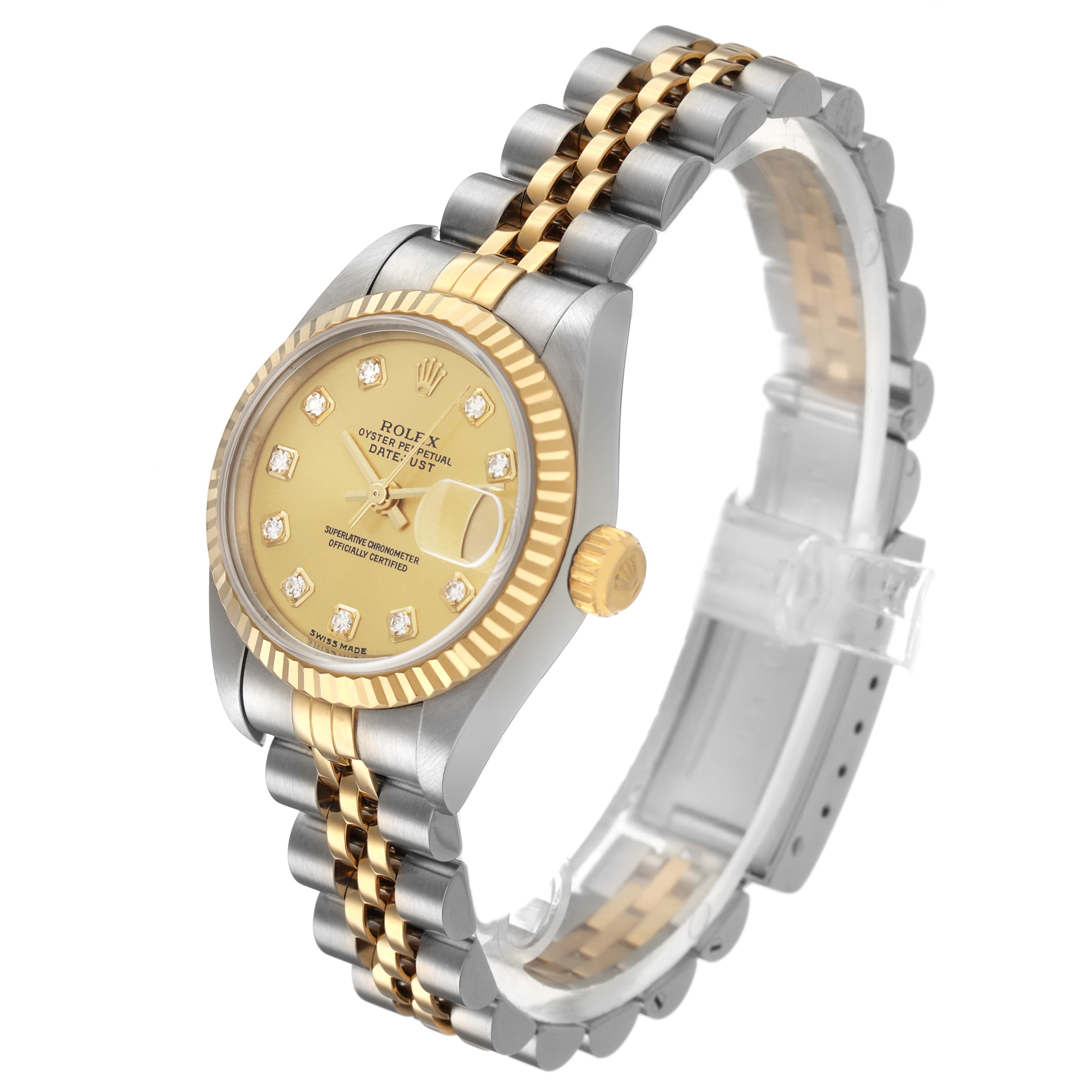 The Rolex Datejust 79173 Women's Steel and Gold (two tone) Champagne Dial watch is shown at a three-quarter angle, highlighting the jubilee bracelet and fluted bezel.