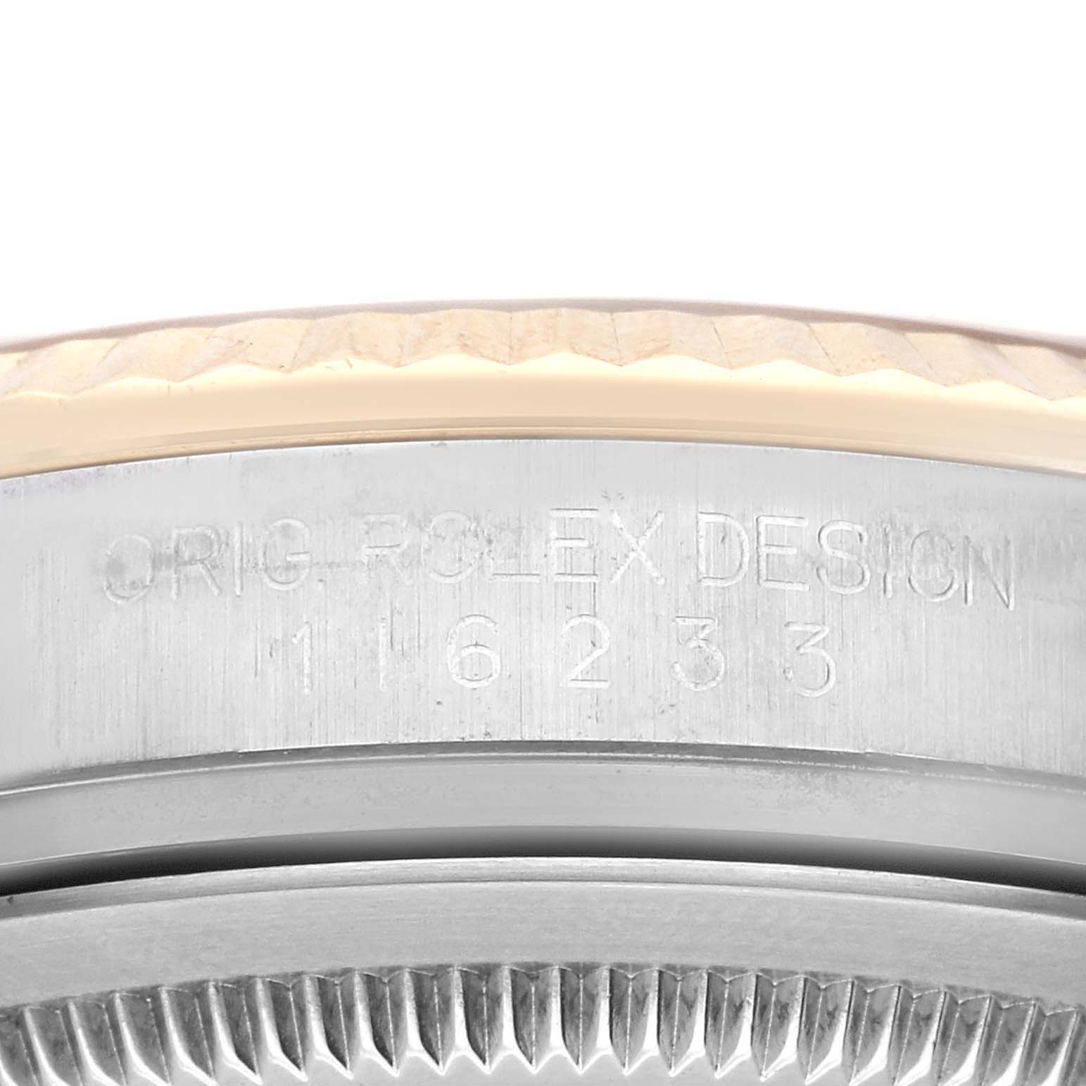 The image shows a close-up of the engraved case side of a Rolex Datejust 116233 Men's Steel and Gold (two tone) Champagne Dial 116233 Men's Steel and Gold (two tone) Champagne Dial watch, displaying the model number.