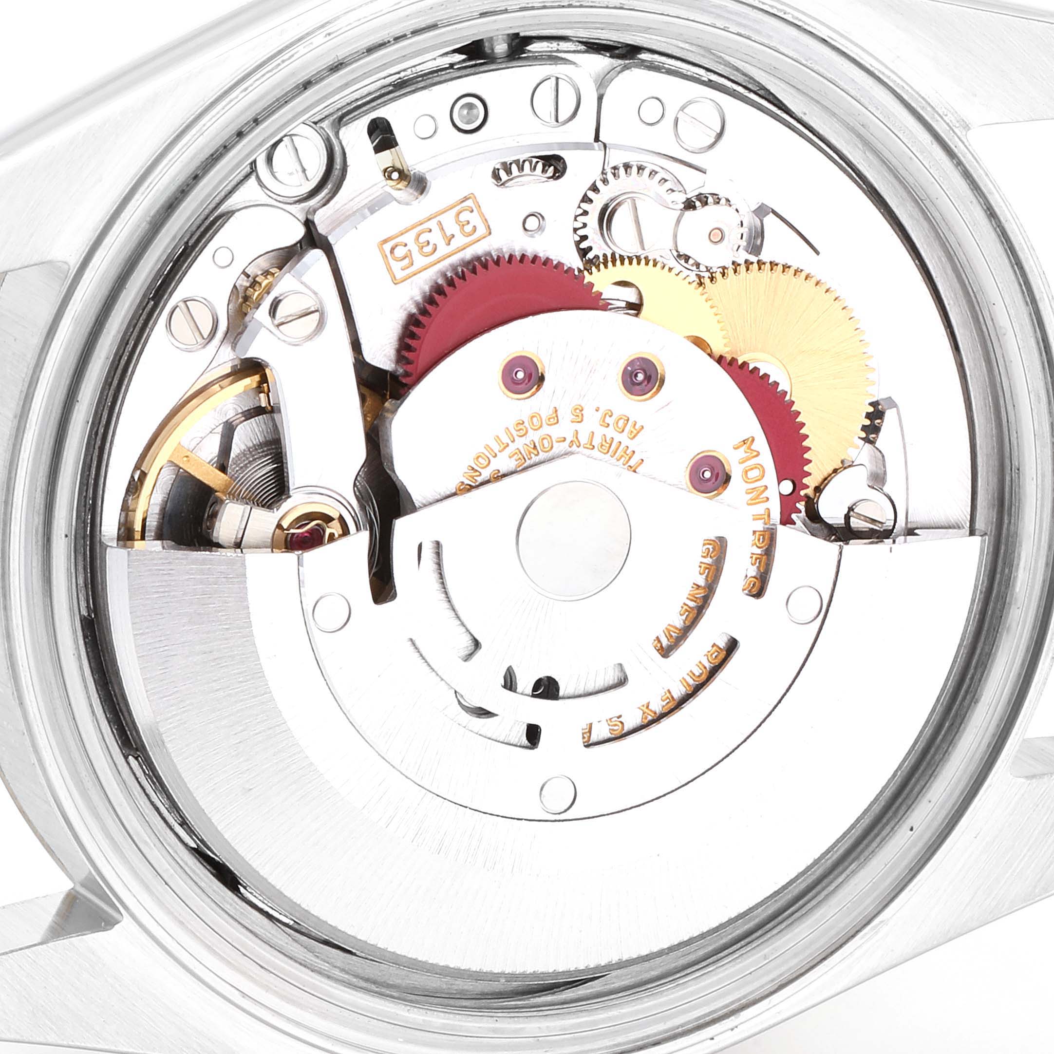 This image shows a close-up view of the internal mechanism, specifically the movement, of a Rolex Datejust 16233 Men
s Steel and Gold (two tone) White Dial 16233 Men
s Steel and Gold (two tone) White Dial watch.