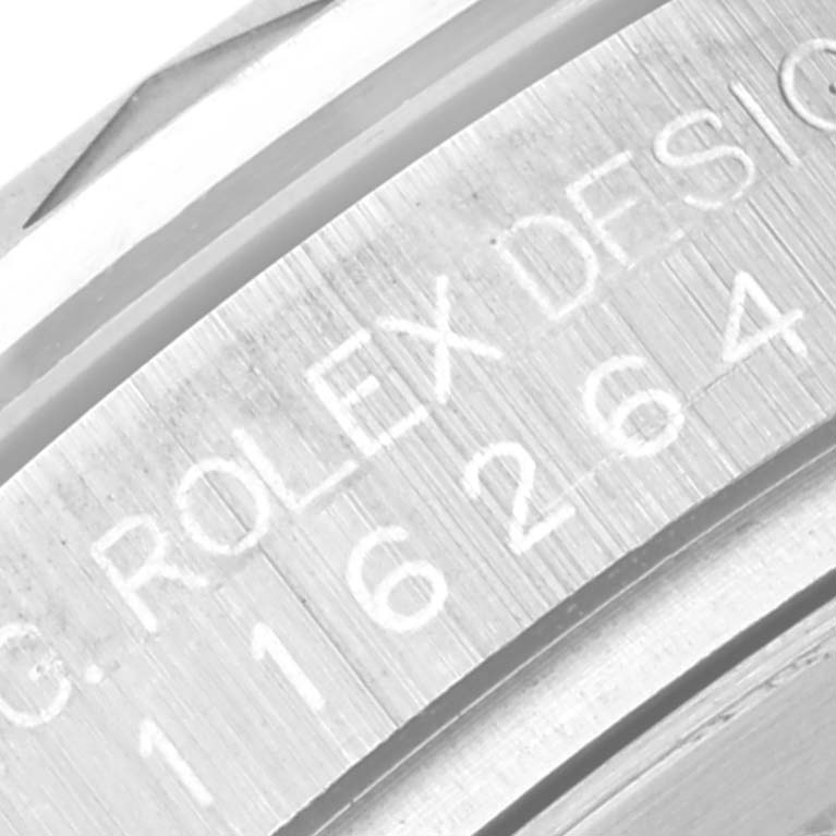 The image shows a close-up of the case with engraved text on a Rolex Turn-o-Graph 116264 Men
s Stainless Steel Blue Dial 116264 Men
s Stainless Steel Blue Dial model, focusing on the model number and brand inscription.