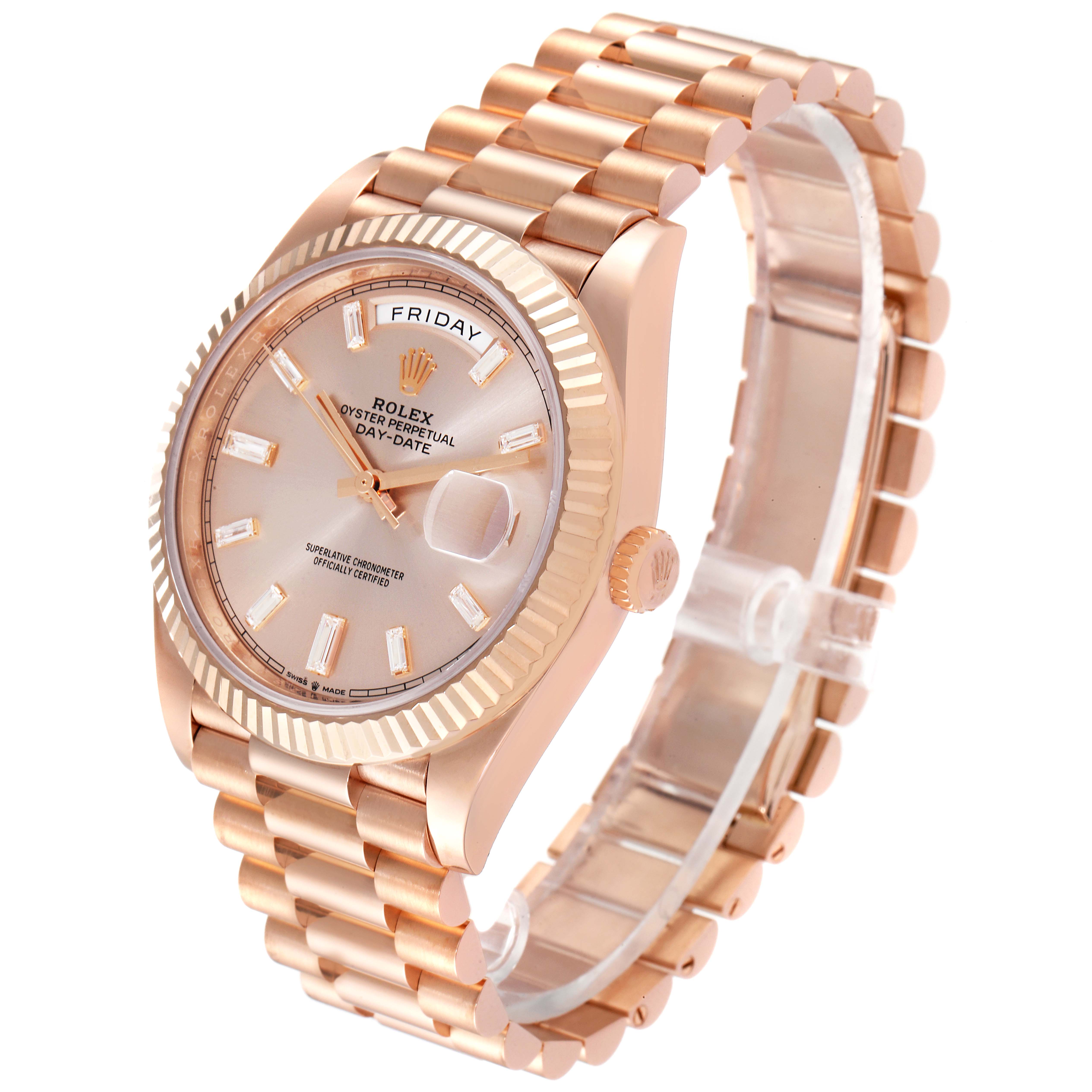 This image shows a Rolex President 228235 Men's Rose Gold Pink Dial 228235 Men's Rose Gold Pink Dial model watch at a three-quarter angle, highlighting the dial, fluted bezel, bracelet, and crown.
