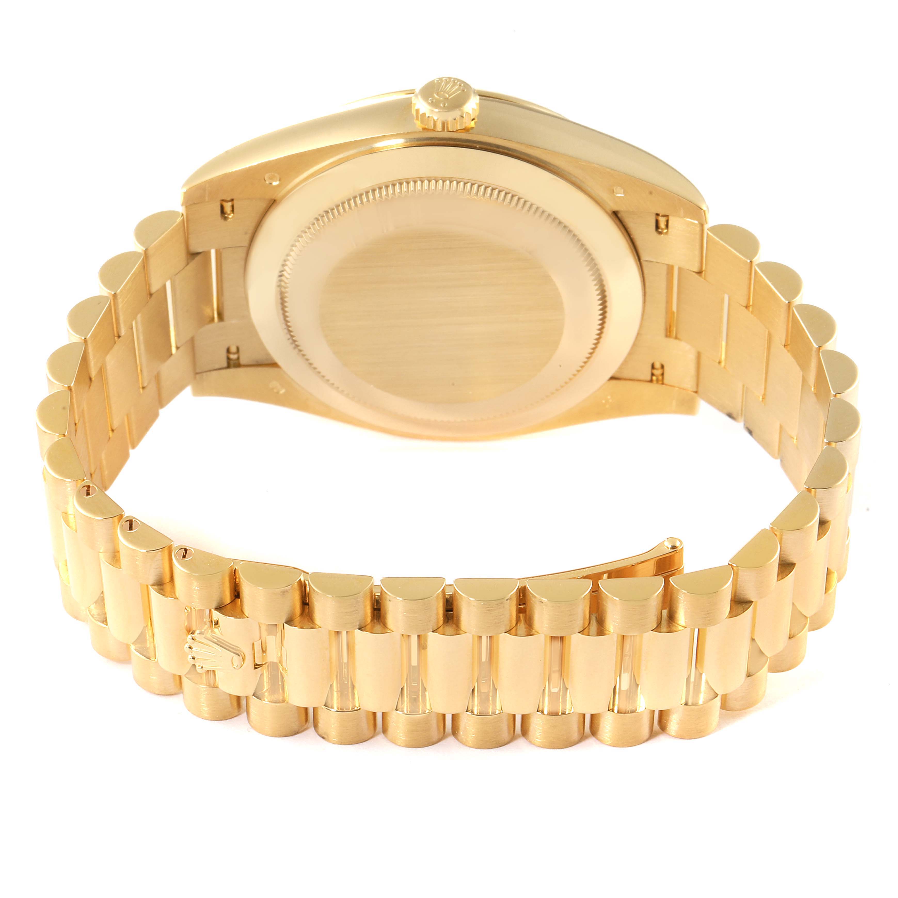 The image shows the rear view of a Rolex President 218238 Men's Yellow Gold Silver Dial 218238 Men's Yellow Gold Silver Dial model watch focusing on the case back and the gold bracelet.