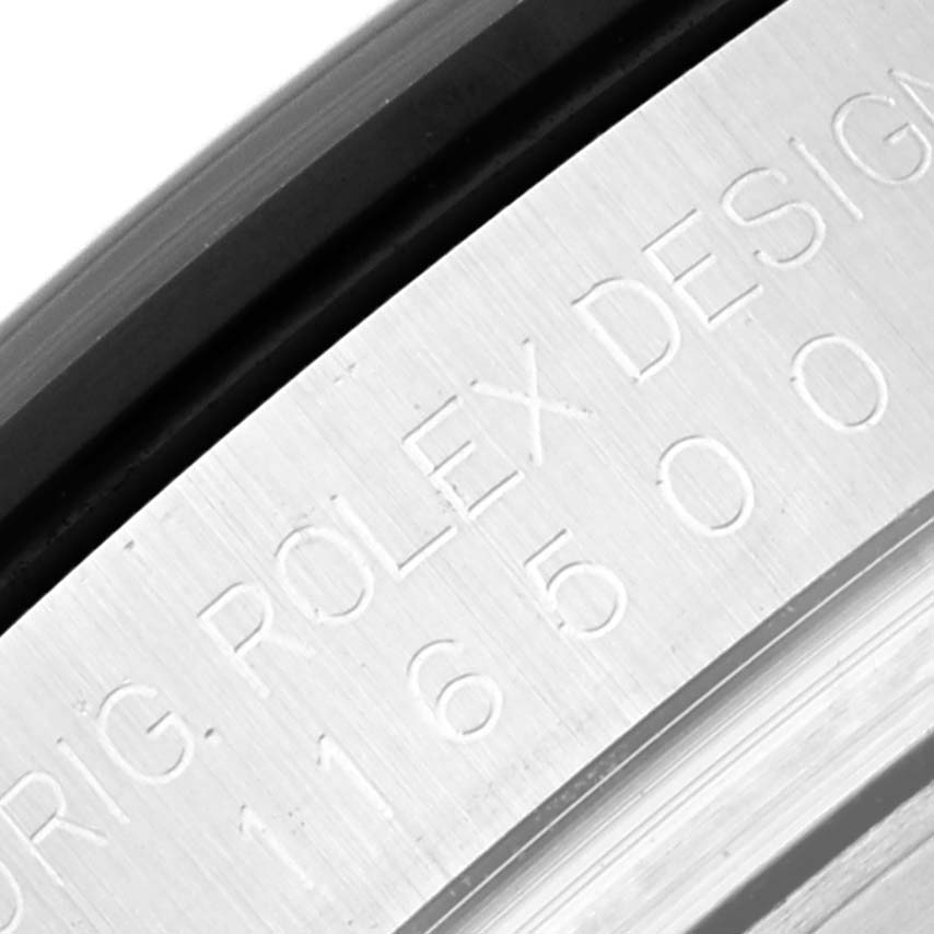 The image shows a close-up of the engraving on the side of the bezel of a Rolex Daytona 116500LN Men's Stainless Steel White Dial 116500LN Men's Stainless Steel White Dial watch.