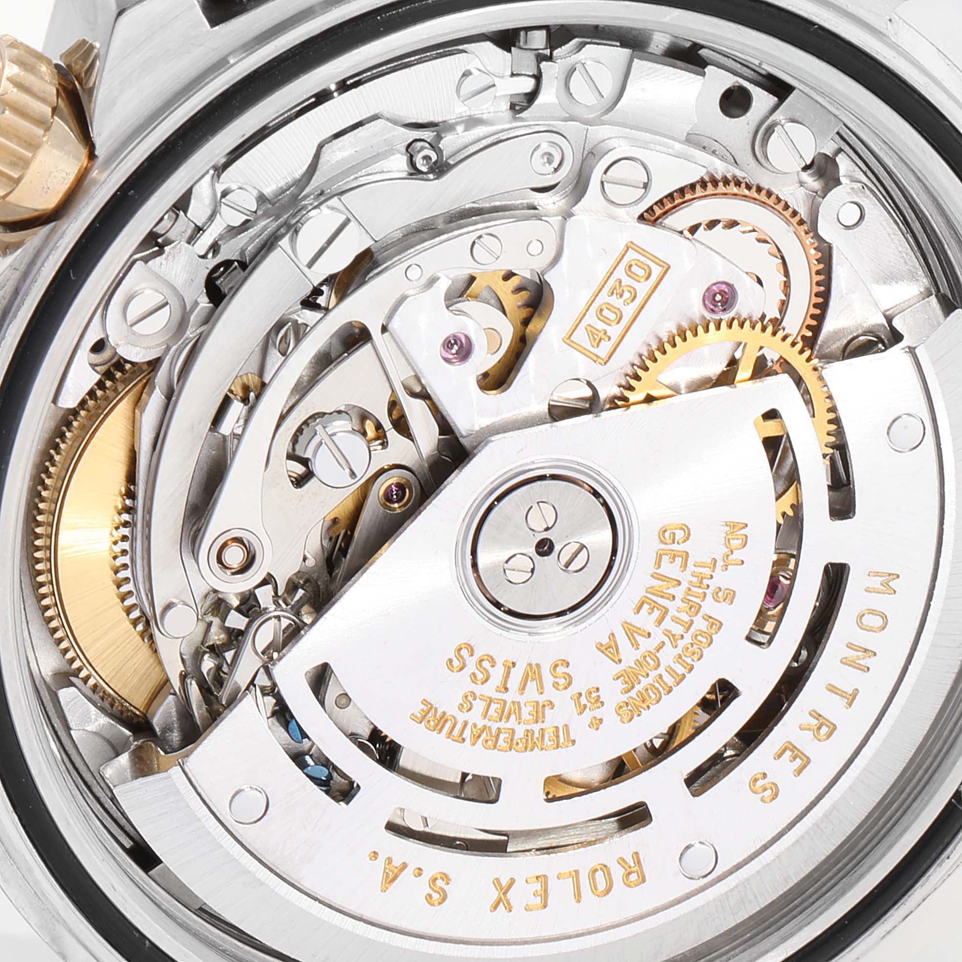 This image shows the intricate movement and inner mechanical components of a Rolex Daytona 16523 Men
s Steel and Gold (two tone) Champagne Dial 16523 Men
s Steel and Gold (two tone) Champagne Dial watch.