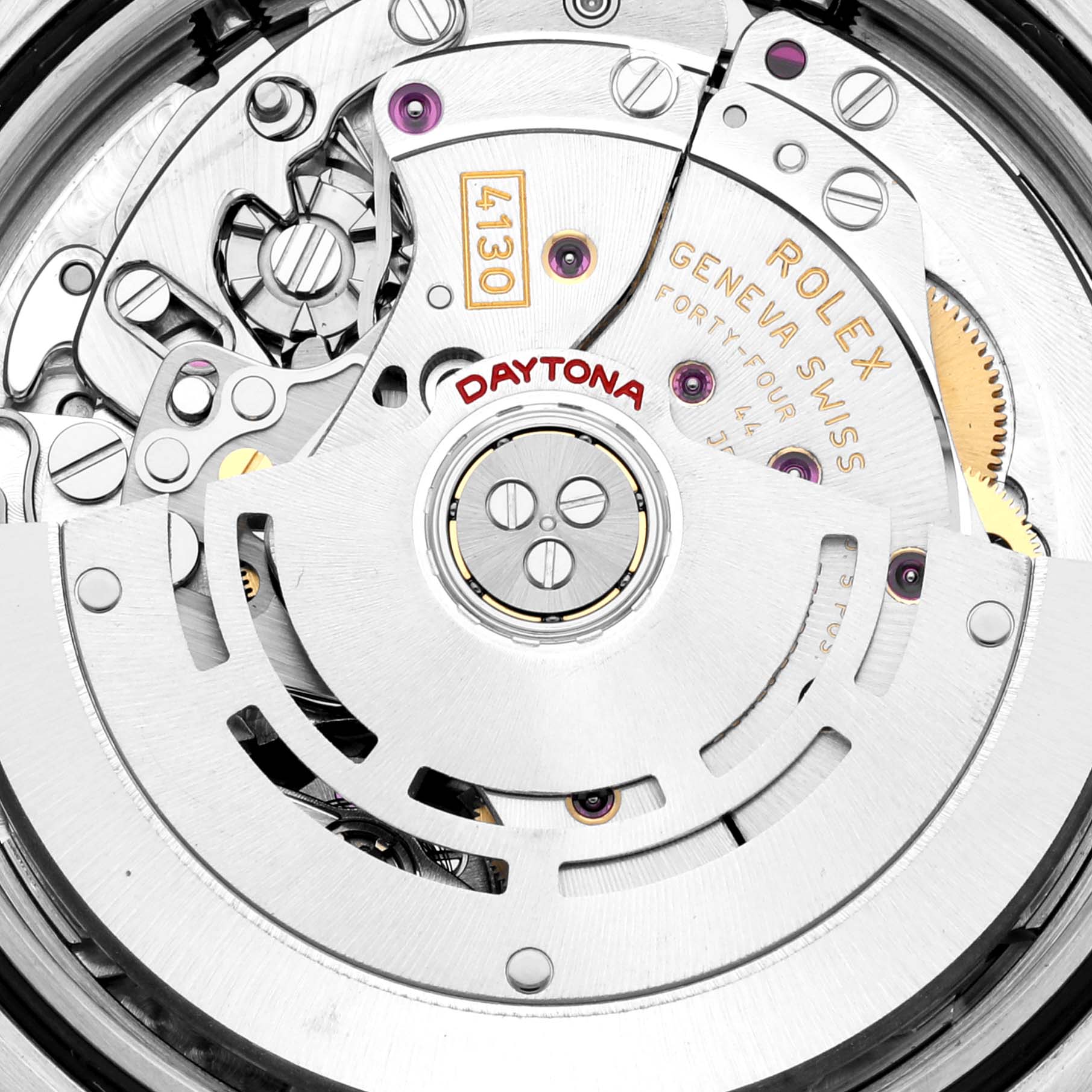 The image shows the internal movement mechanism of a Rolex Daytona 116520 Men's Stainless Steel White Dial 116520 Men's Stainless Steel White Dial watch, focusing on the intricate details of its components.