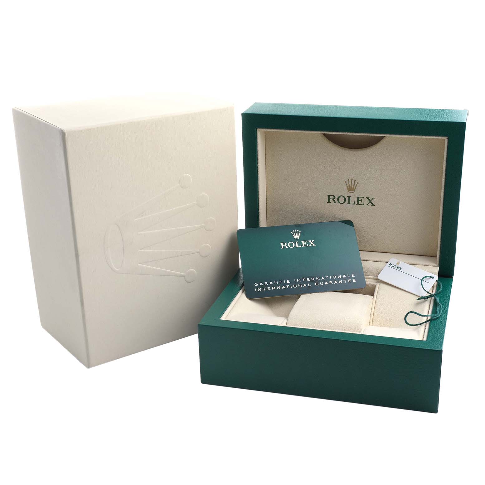 The image shows a Rolex Daytona 126519 Men's White Gold Black Dial watch box with guarantee card and tags, viewed from a front angle.